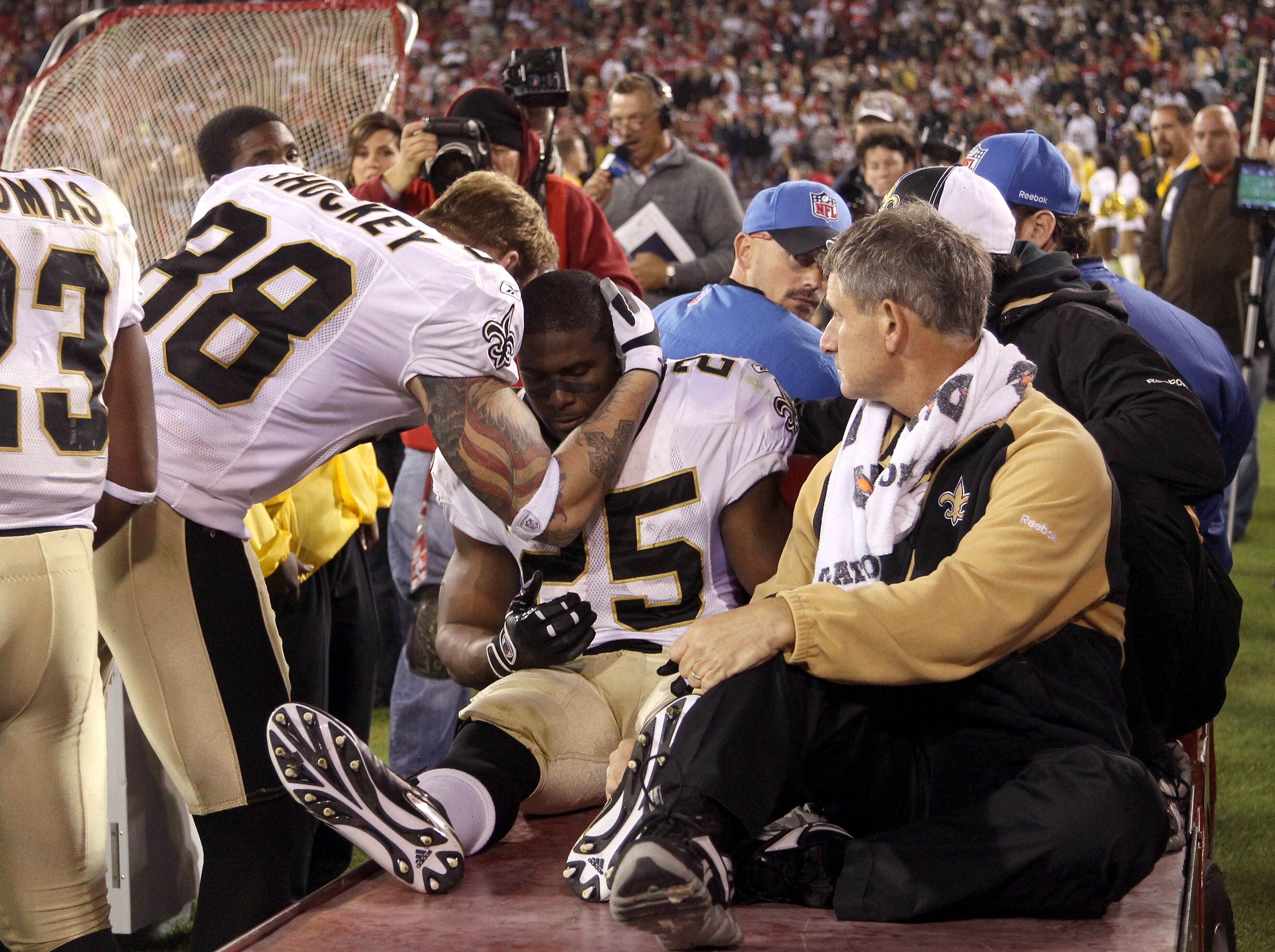 SAN FRANCISCO - SEPTEMBER 20:  Reggie Bush #25 of the New Orleans Saints is consoled by Jeremy Shockey #88 before Bush leaves the field due to an injury during their game against the San Francisco 49ers at Candlestick Park on September 20, 2010 in San Fra