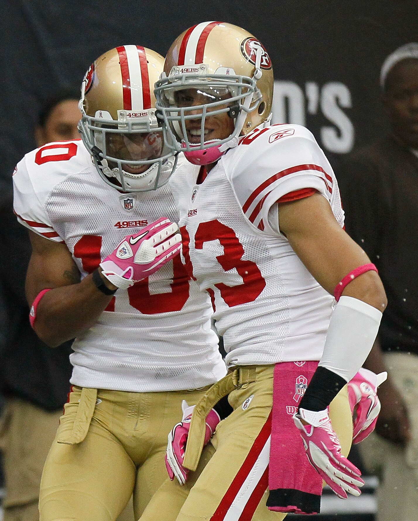 ATLANTA - OCTOBER 03:  Taylor Mays #23 of the San Francisco 49ers reacts after recovering a blocked punt for a touchdown against the Atlanta Falcons with Kyle Williams #10 at Georgia Dome on October 3, 2010 in Atlanta, Georgia.  (Photo by Kevin C. Cox/Get