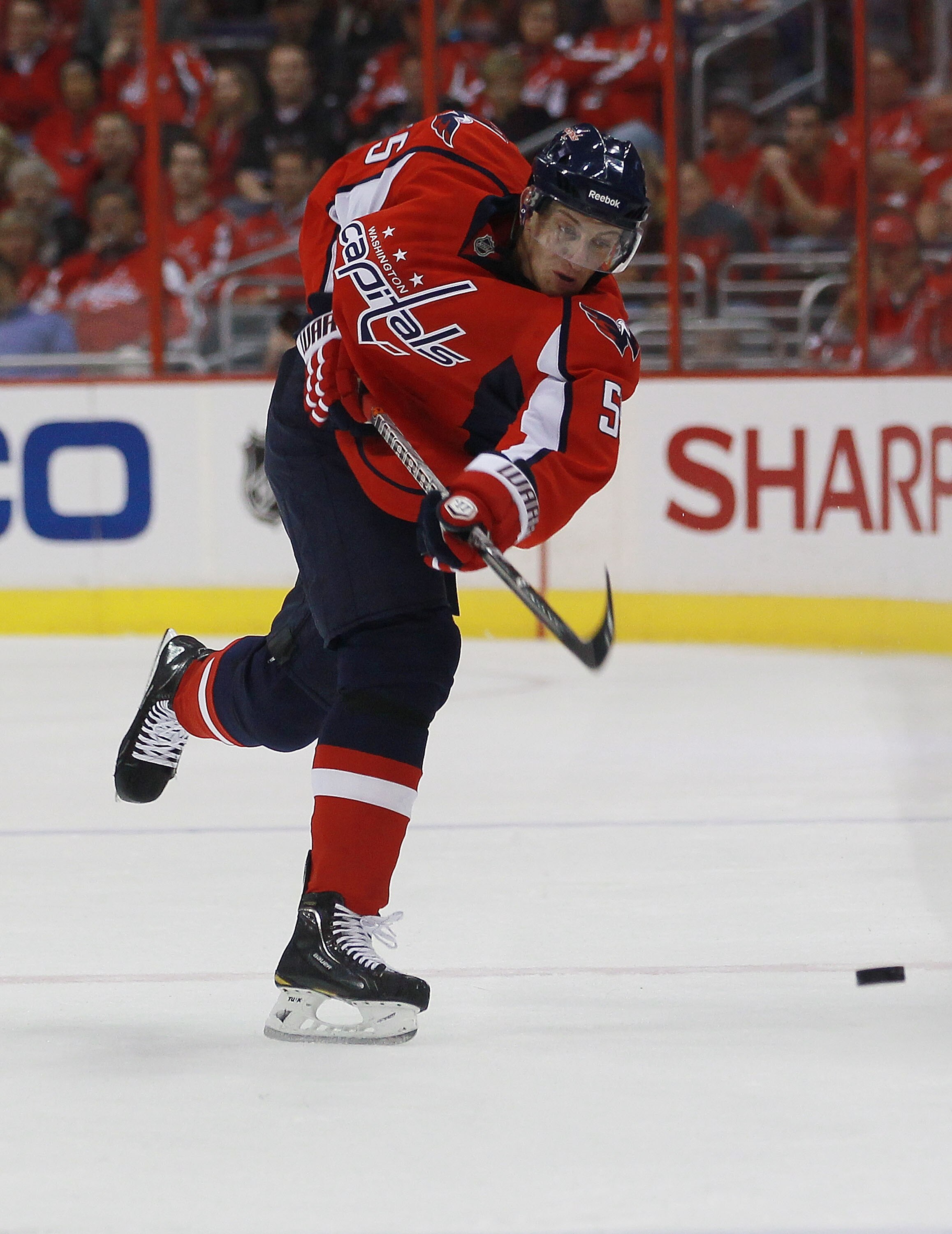 WASHINGTON - OCTOBER 13:  Jeff Schultz #55 of the Washington Capitals skates against the New York Islanders at the Verizon Center on October 13, 2010 in Washington, DC.  (Photo by Bruce Bennett/Getty Images)