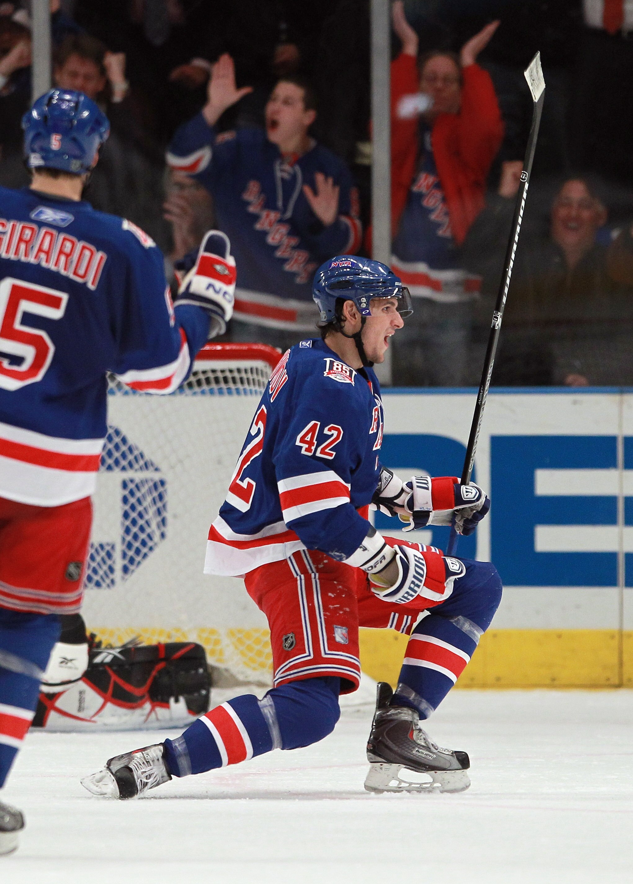 NEW YORK - NOVEMBER 11: Artem Anisimov #42 of the New York Rangers scores the game winning goal at 1:32 of overtime against the Buffalo Sabres at Madison Square Garden on November 11, 2010 in New York City. The Rangers defeated the Sabres 3-2 in overtime.