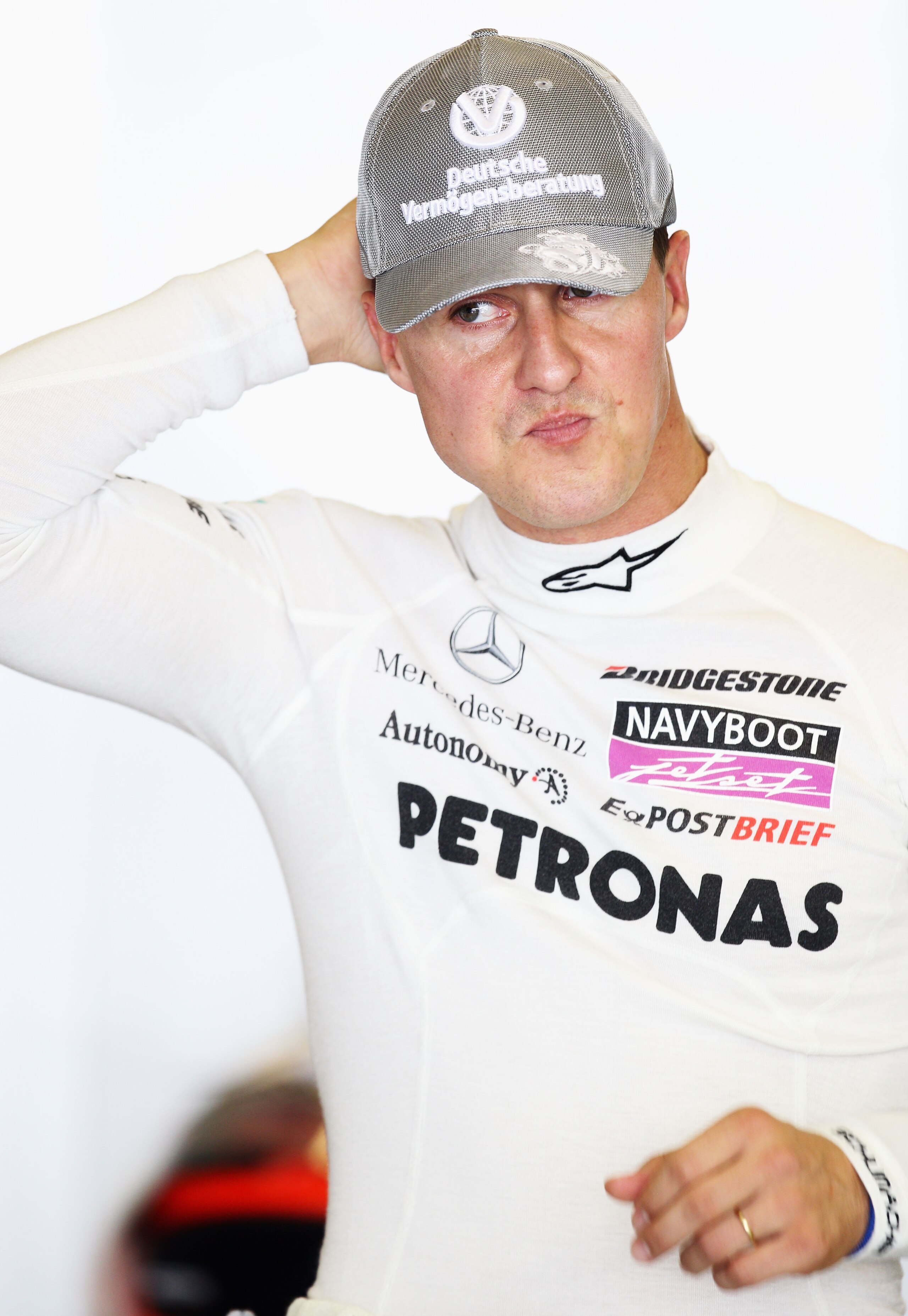 ABU DHABI, UNITED ARAB EMIRATES - NOVEMBER 13:  Michael Schumacher of Germany and Mercedes GP prepares to drive during the final practice session prior to qualifying for the Abu Dhabi Formula One Grand Prix at the Yas Marina Circuit on November 13, 2010 i