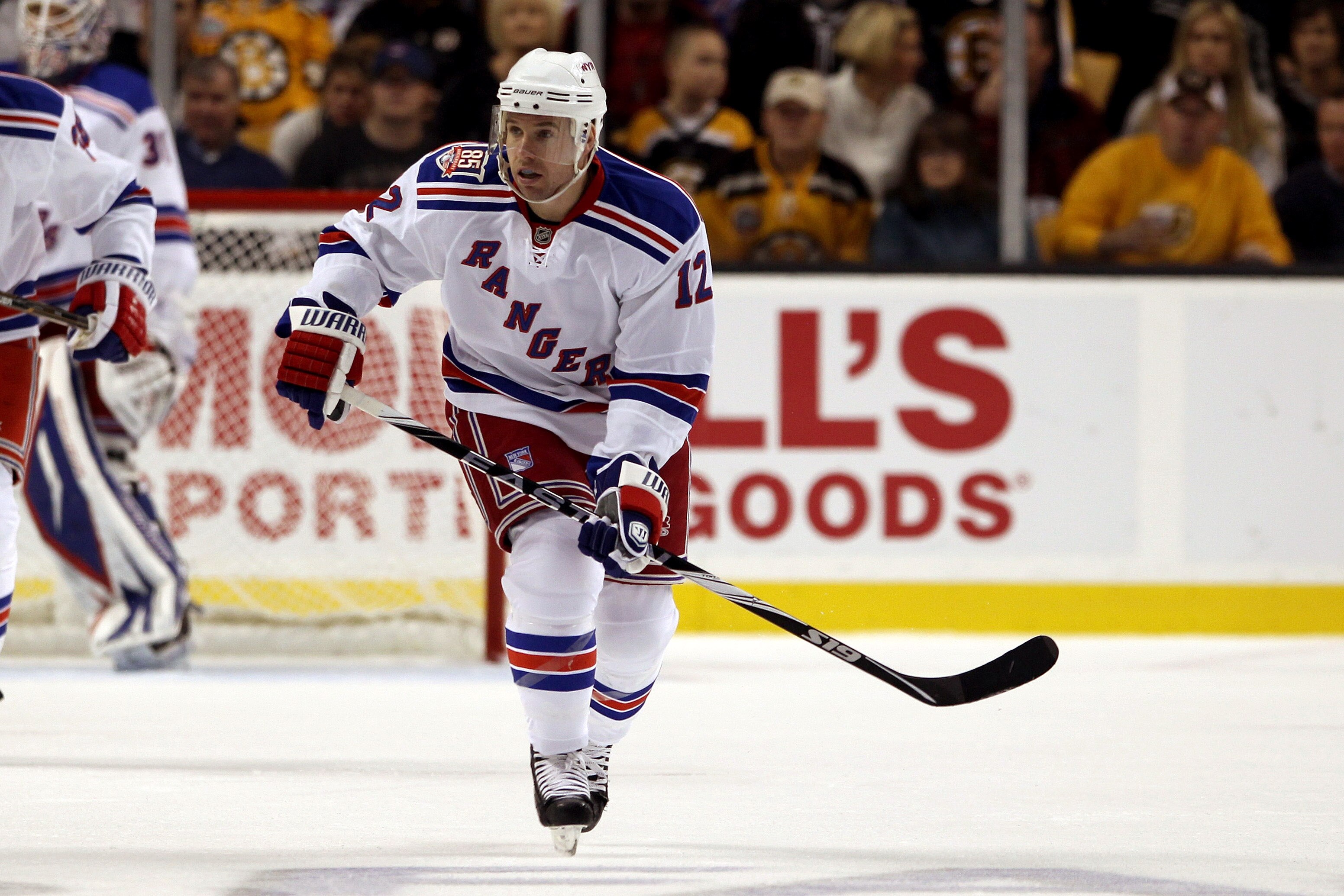 BOSTON - OCTOBER 23:  Todd White #12 of the New York Rangers skates against the Boston Bruins at the TD Garden on October 23, 2010 in Boston, Massachusetts.  The Rangers won 3-2.  (Photo by Bruce Bennett/Getty Images)