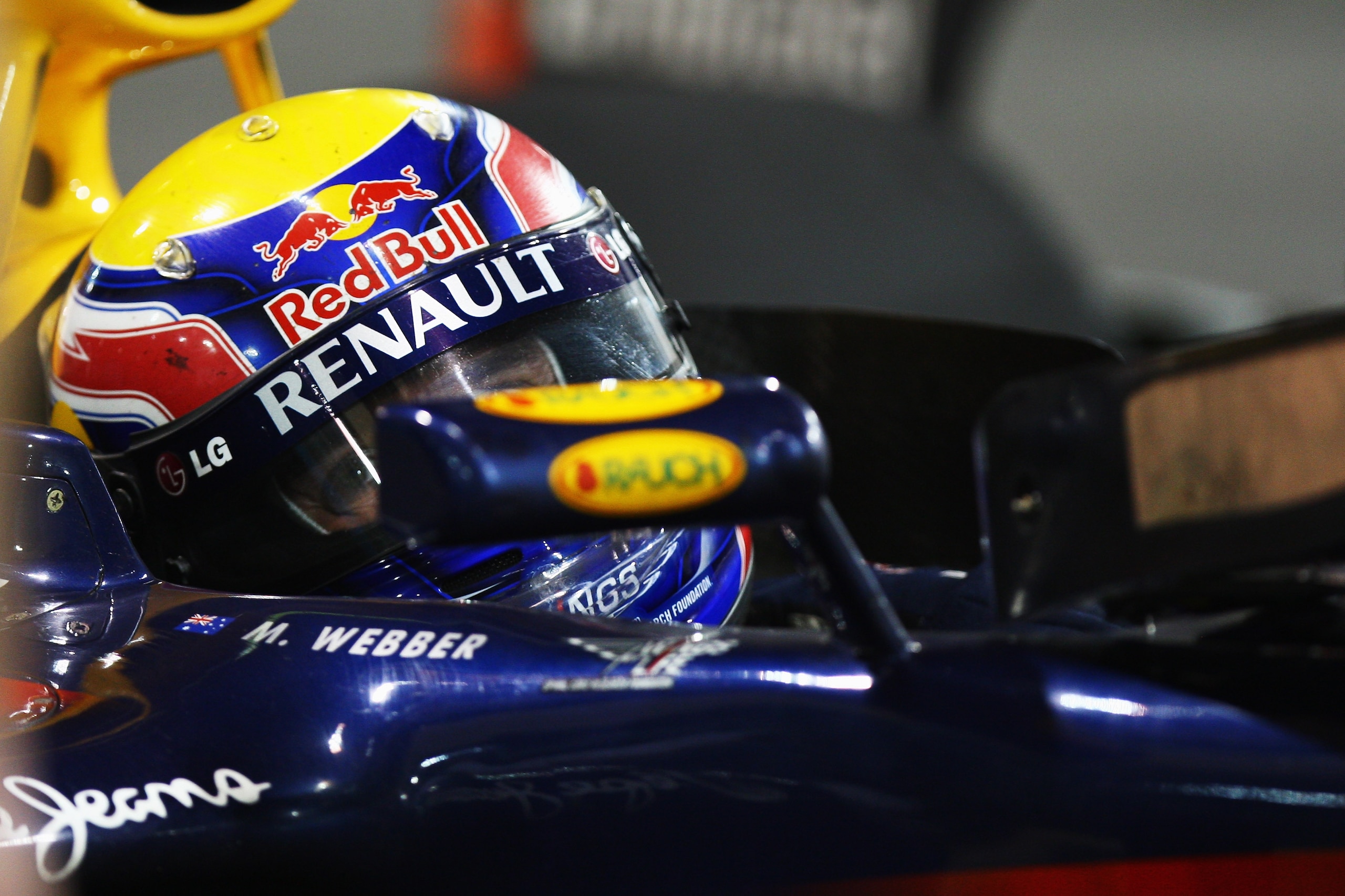 ABU DHABI, UNITED ARAB EMIRATES - NOVEMBER 14:  Mark Webber of Australia and Red Bull Racing drives into parc ferme following the Abu Dhabi Formula One Grand Prix at the Yas Marina Circuit on November 14, 2010 in Abu Dhabi, United Arab Emirates.  (Photo b