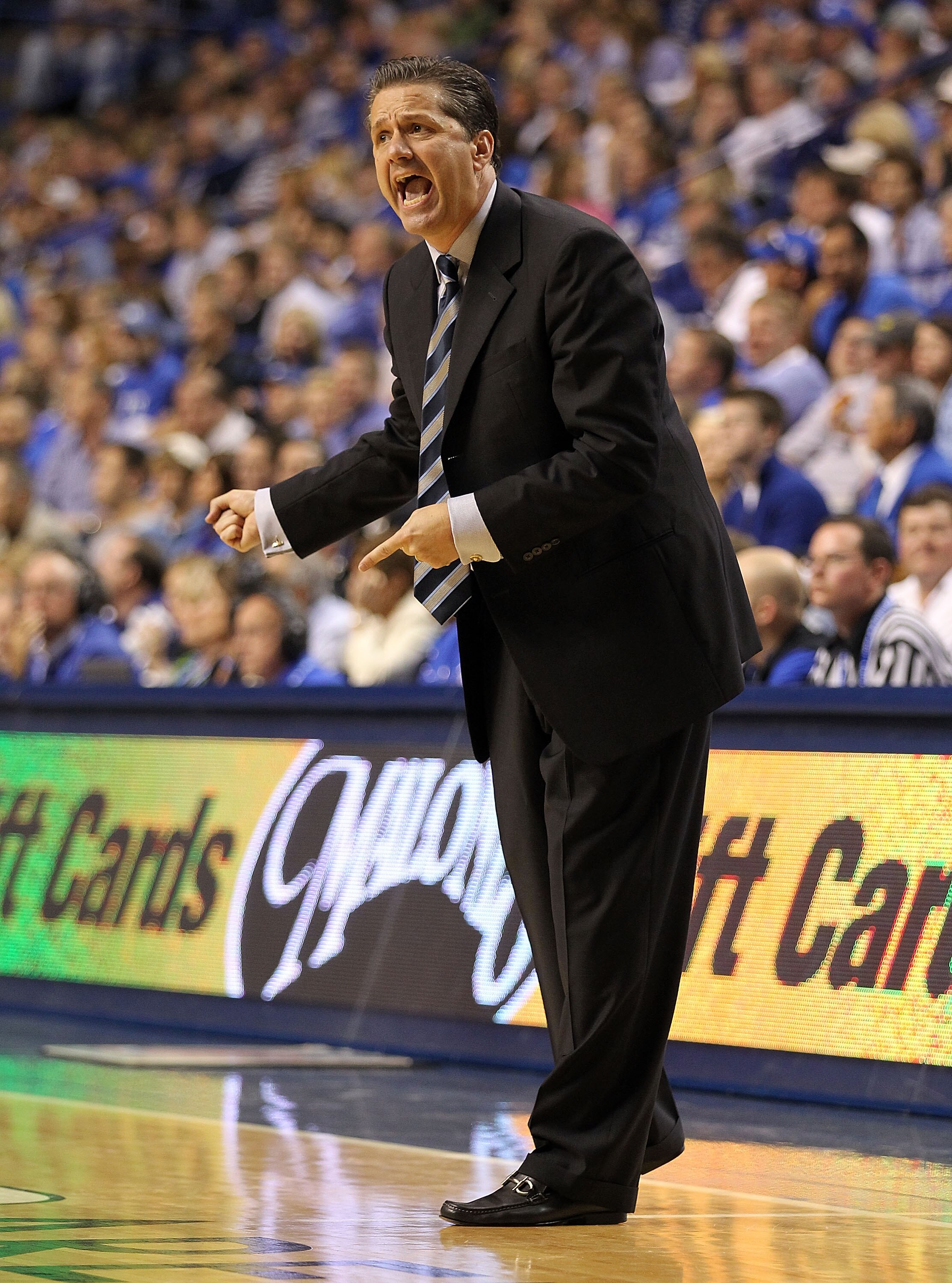 LEXINGTON, KY - NOVEMBER 12:  John Calipari the Head Coach of the Kentucky Wildcats gives   instructions to his team during the game against East Tennessee State Buccaneers at Rupp Arena on November 12, 2010 in Lexington, Kentucky.  (Photo by Andy Lyons/G