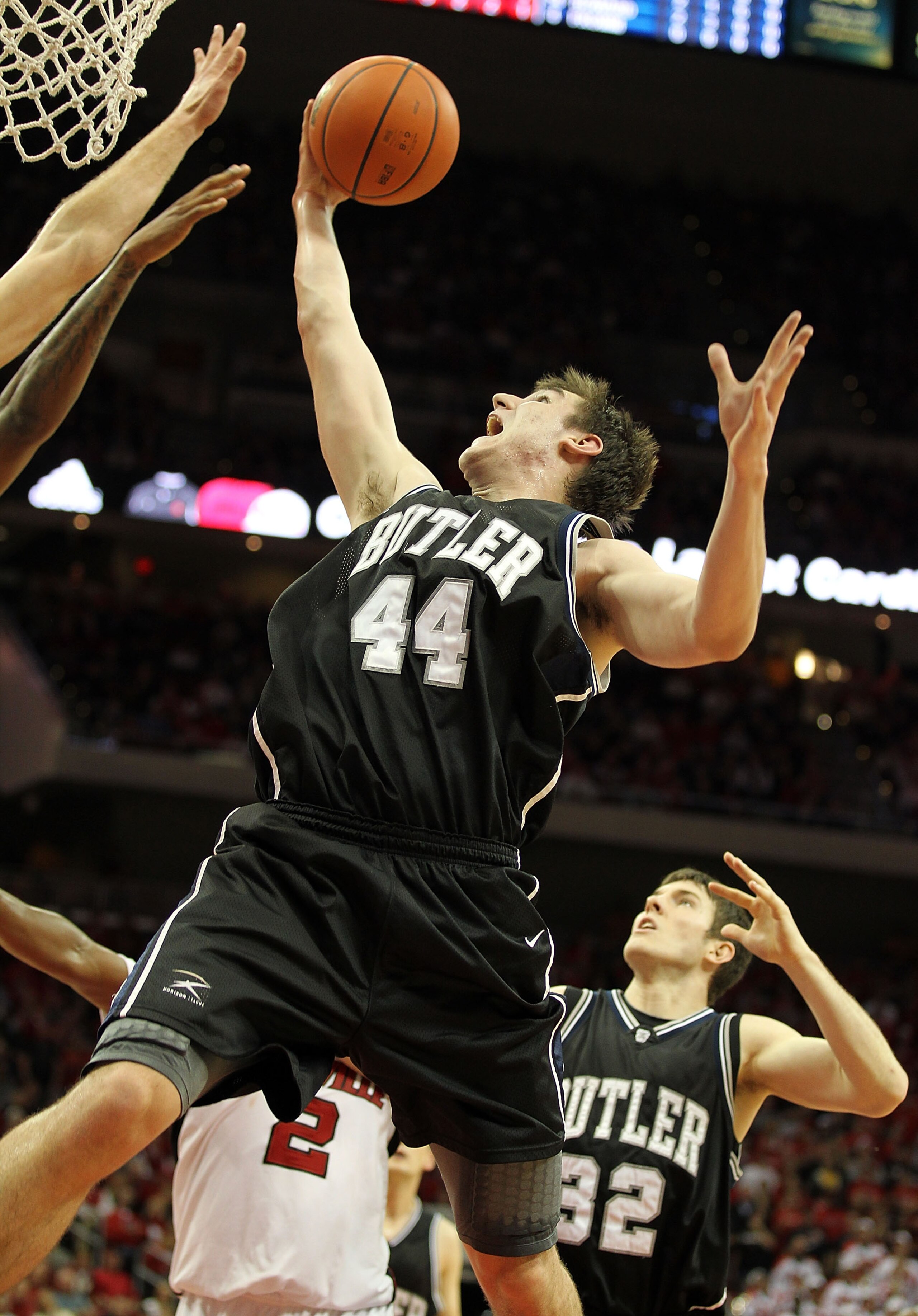 LOUISVILLE, KY - NOVEMBER 16: Matt Howard #54  of the Butler Bulldogs grabs a rebound during the game against the Louisville Cardinals at the KFC Yum! Center on November 16, 2010 in Louisville, Kentucky.  (Photo by Andy Lyons/Getty Images)