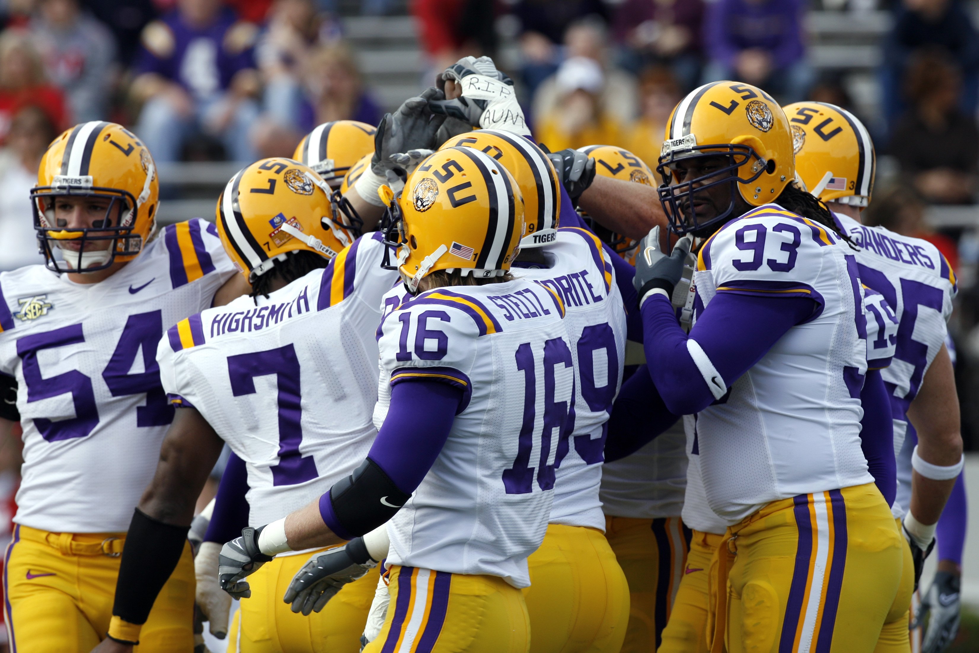 OXFORD, MS - NOVEMBER 17: Ali Highsmith #7, Craig Steltz #16 and Tyson Jackson #93 of the LSU Tigers huddle up with their defense before a game against the Mississippi Rebels on November 17, 2007 at Vaught-Hemingway Stadium/Hollingsworth Field in Oxford, 