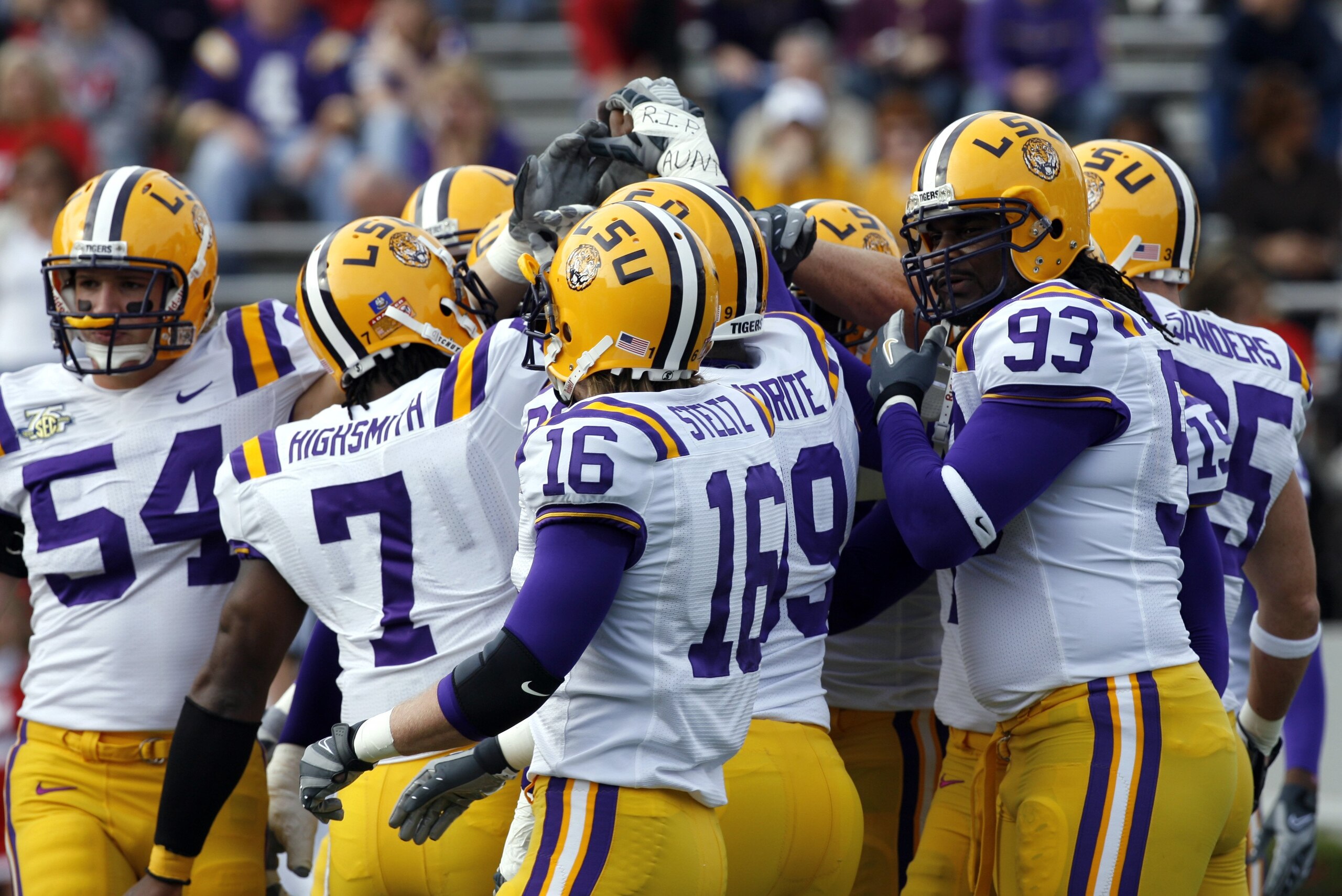 OXFORD, MS - NOVEMBER 17: Ali Highsmith #7, Craig Steltz #16 and Tyson Jackson #93 of the LSU Tigers huddle up with their defense before a game against the Mississippi Rebels on November 17, 2007 at Vaught-Hemingway Stadium/Hollingsworth Field in Oxford, 