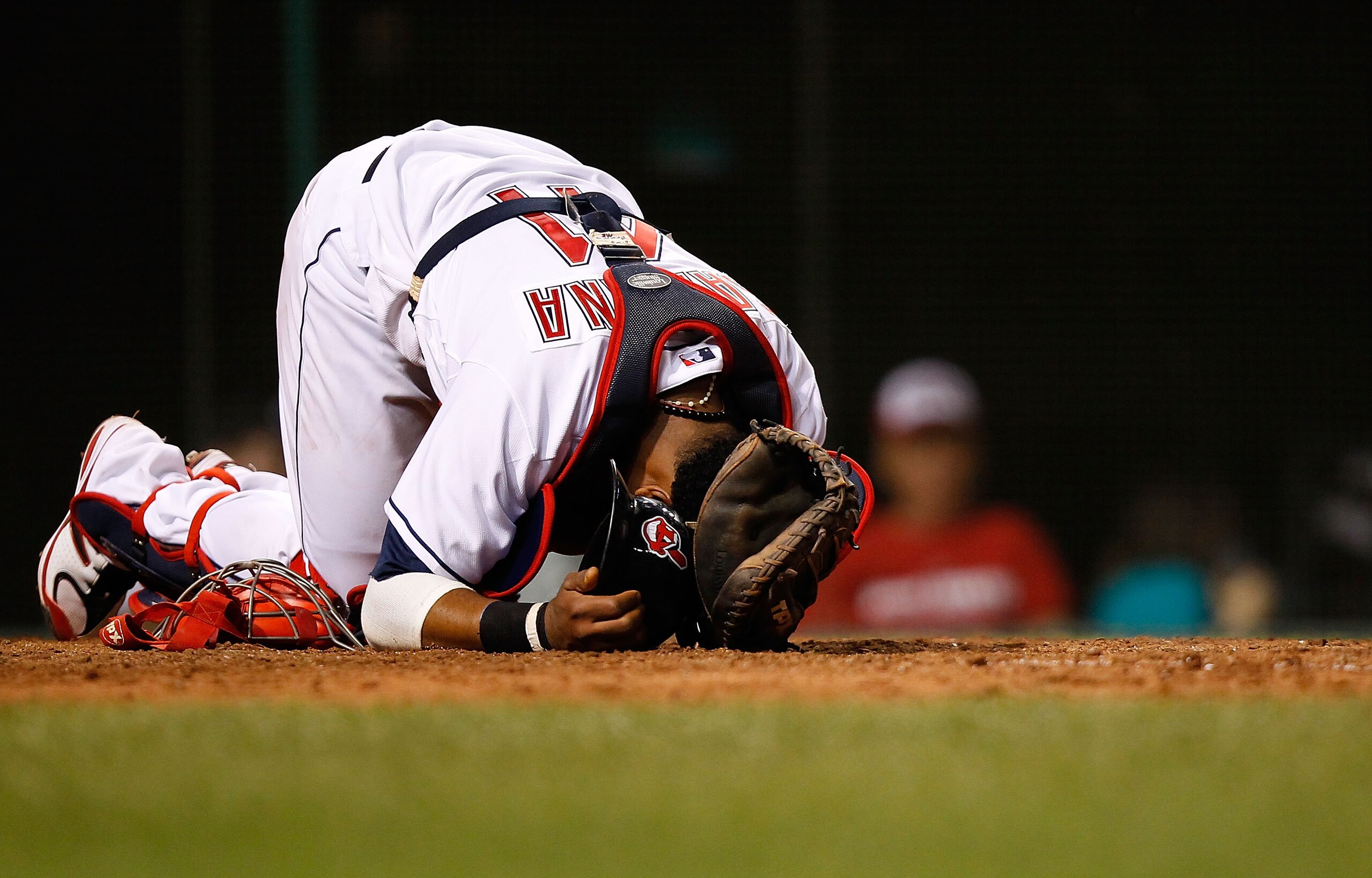 CLEVELAND - JULY 29: Carlos Santana #41 of the Cleveland Indians grimaces in pain after a ball hit him in the knee during the game against the New York Yankees on July 29, 2010 at Progressive Field in Cleveland, Ohio. (Photo by Jared Wickerham/Getty Ima CLEVELAND - JULY 29: Carlos Santana #41 of the Cleveland Indians grimaces in pain after a ball hit him in the knee during the game against the New York Yankees on July 29, 2010 at Progressive Field in Cleveland, Ohio. (Photo by Jared Wickerham/Getty Ima