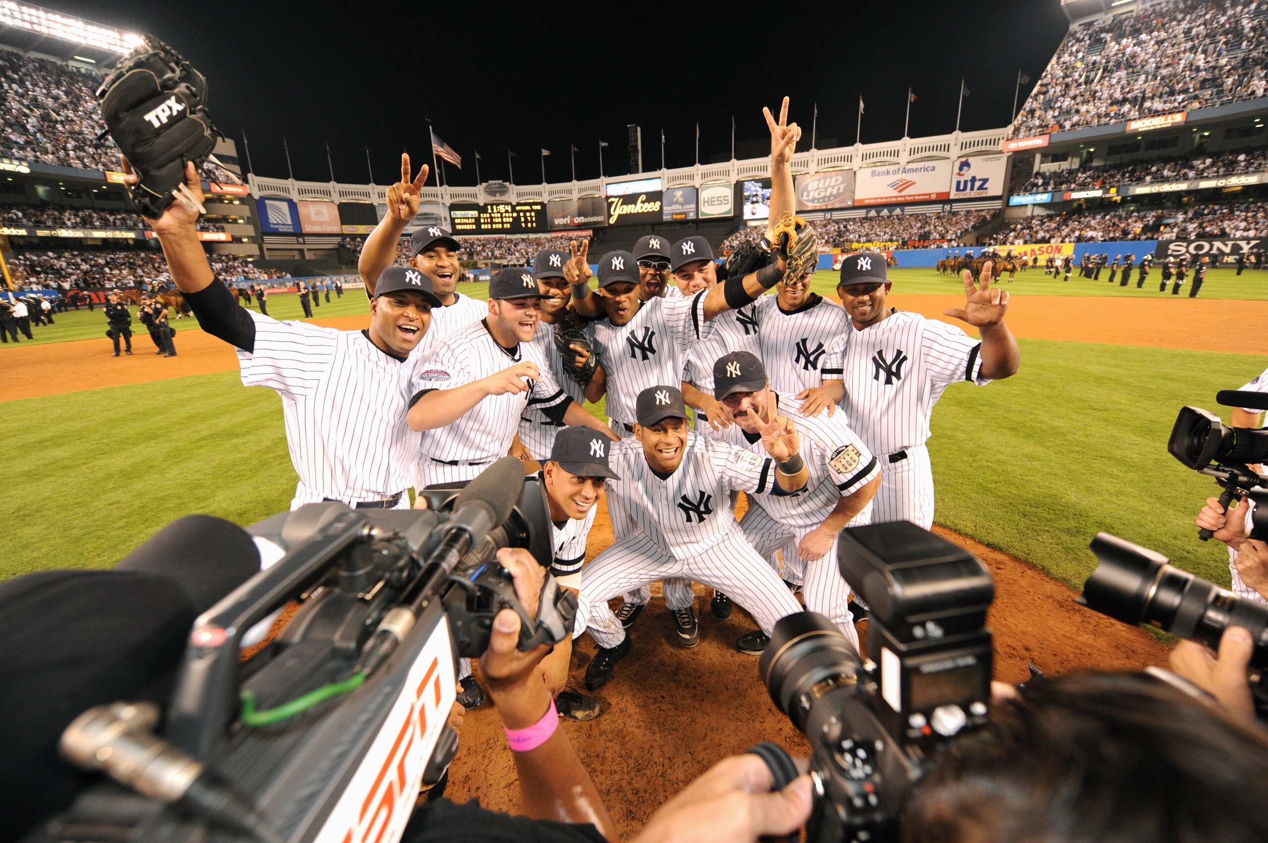 NEW YORK - SEPTEMBER 21:  The New York Yankee pose after winning the game against the Baltimore Orioles and the last regular season game at Yankee Stadium on September 21, 2008 in the Bronx borough of New York City. The Yankees are playing their final sea
