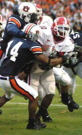 Carlos Rogers 14 makes a tackle against UGA in 2004