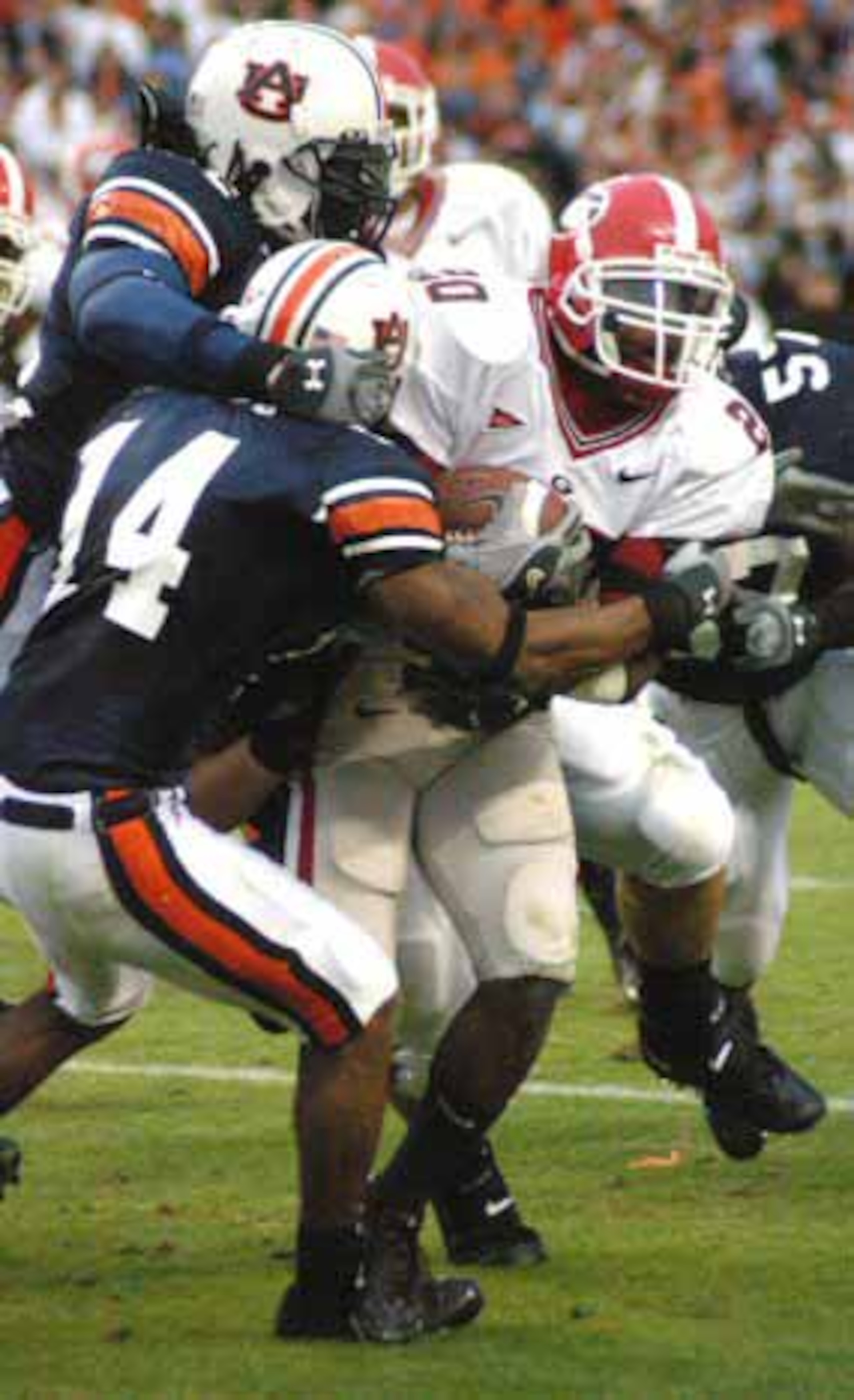 Carlos Rogers 14 makes a tackle against UGA in 2004