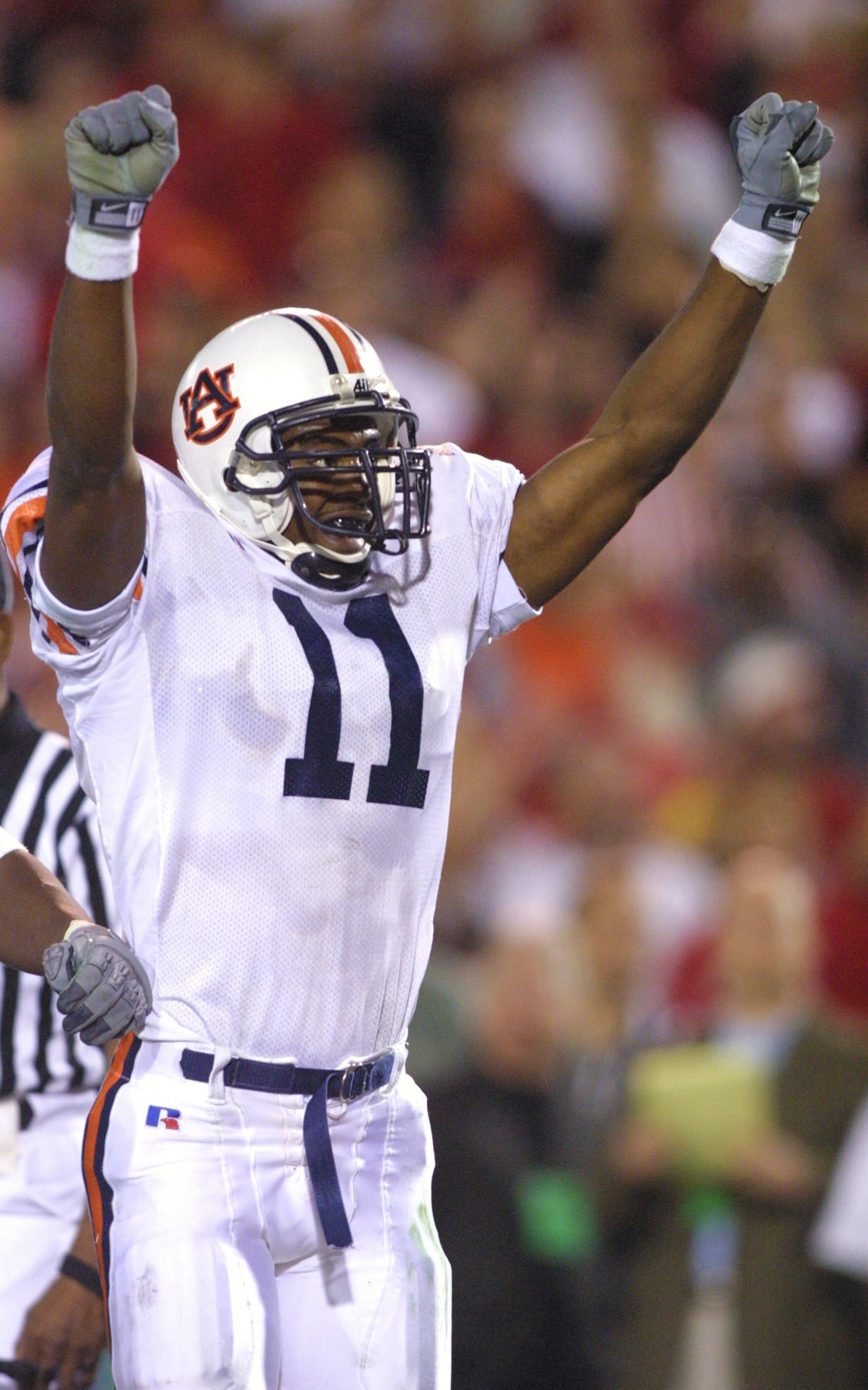 10 NOV 2001:  Defender Karlos Dansby #11 of Auburn celebrates after the Tigers defeated the Georgia Bulldogs 24-17 at Sanford Stadium in Athens, Georgia DIGITAL IMAGE.  Mandatory Credit: Scott Halleran/ALLSPORT
