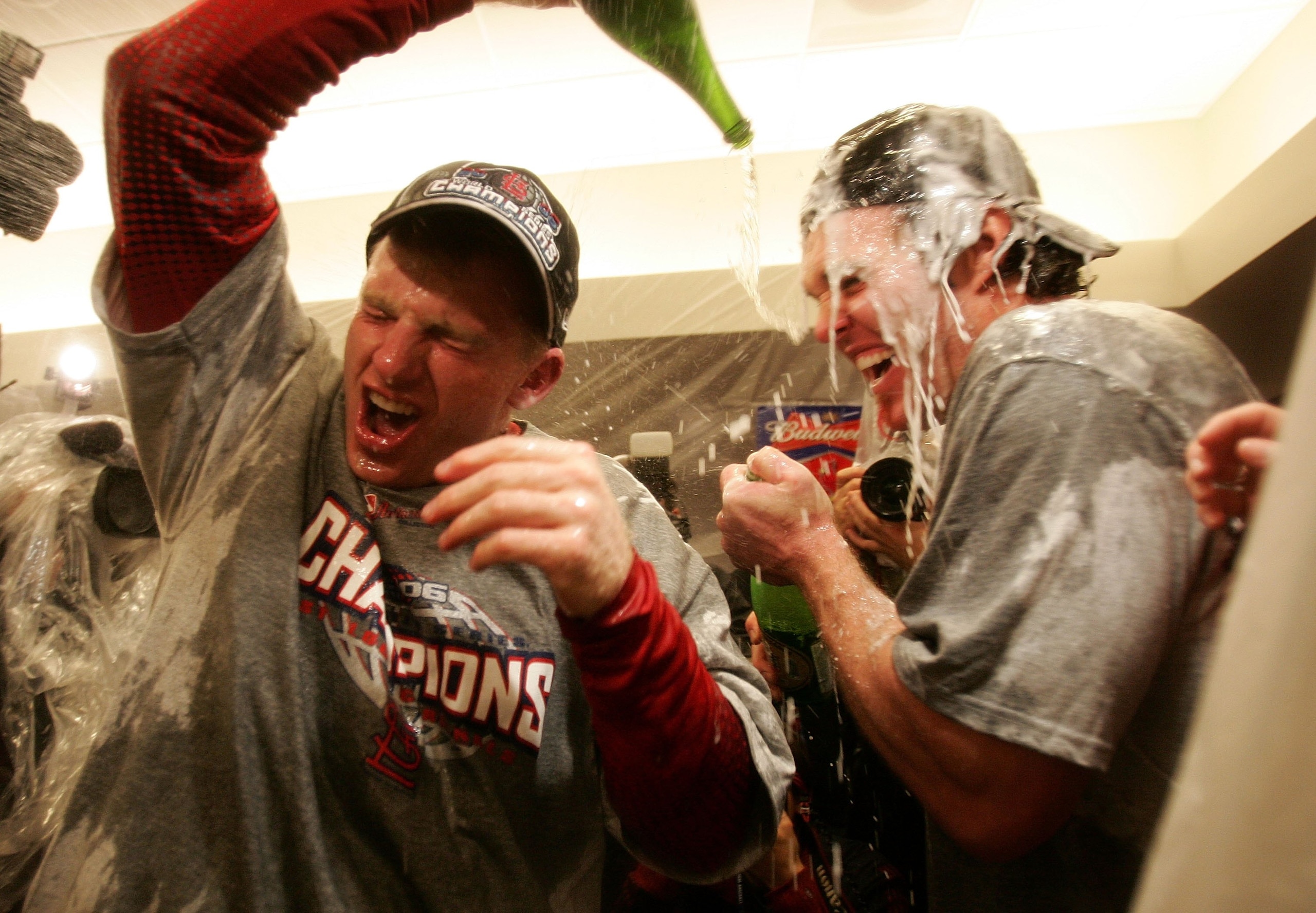 ST LOUIS, MO - OCTOBER 27:  (L-R) World Series MVP David Eckstein #22 and Scott Spiezio #26 of the St. Louis Cardinals spray each other in the locker room with champange as they celebrate their 4-2 win against the Detroit Tigers in Game Five to win the 20