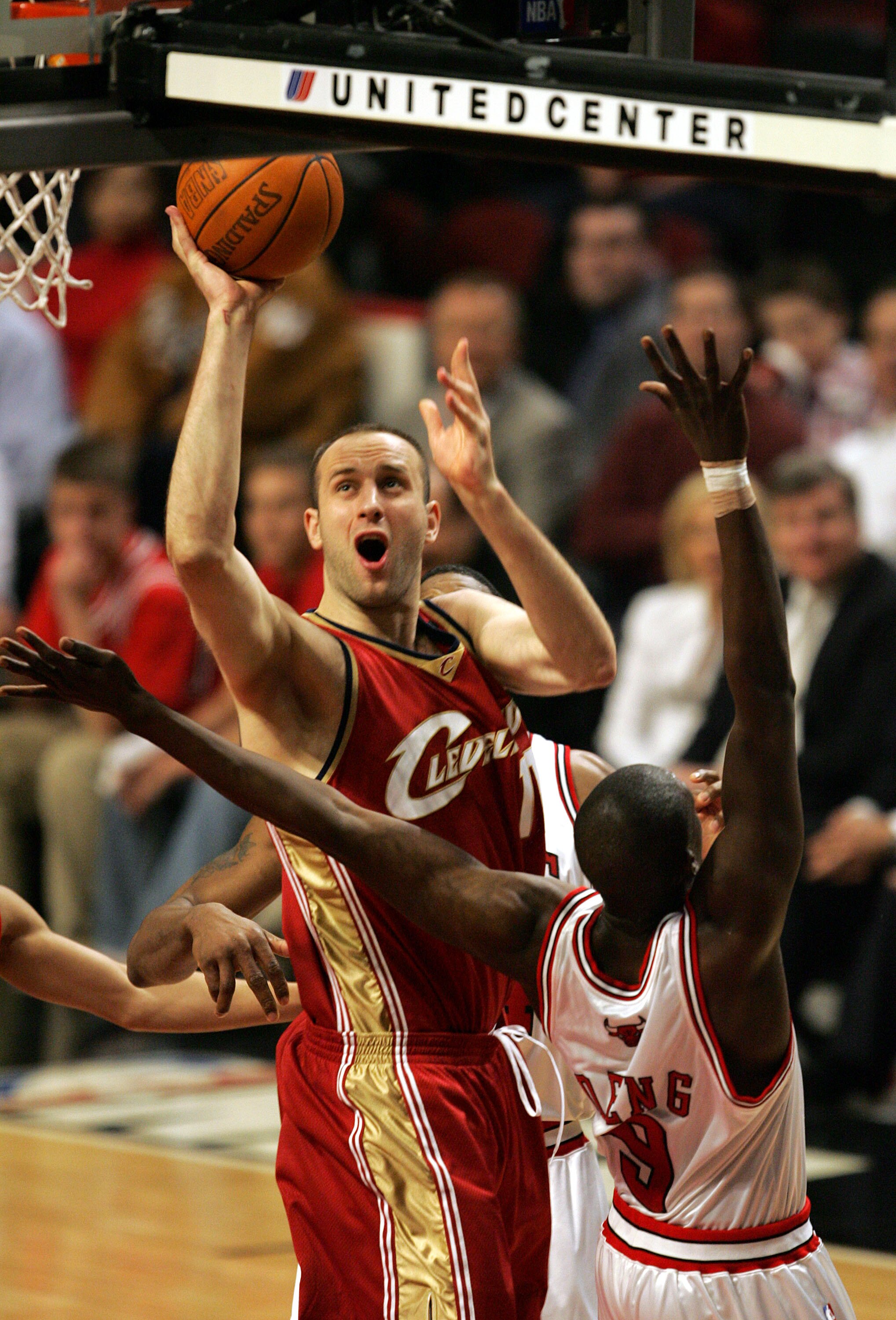 CHICAGO - MARCH 31:  Zydrunas Ilgauskas #11 of the Cleveland Cavaliers shoots over Luol Deng #9 of the Chicago Bulls during the game on March 31, 2005 at the United Center in Chicago, Illinois. The Bulls defeated the Cavaliers 102-90 in overtime. NOTE TO