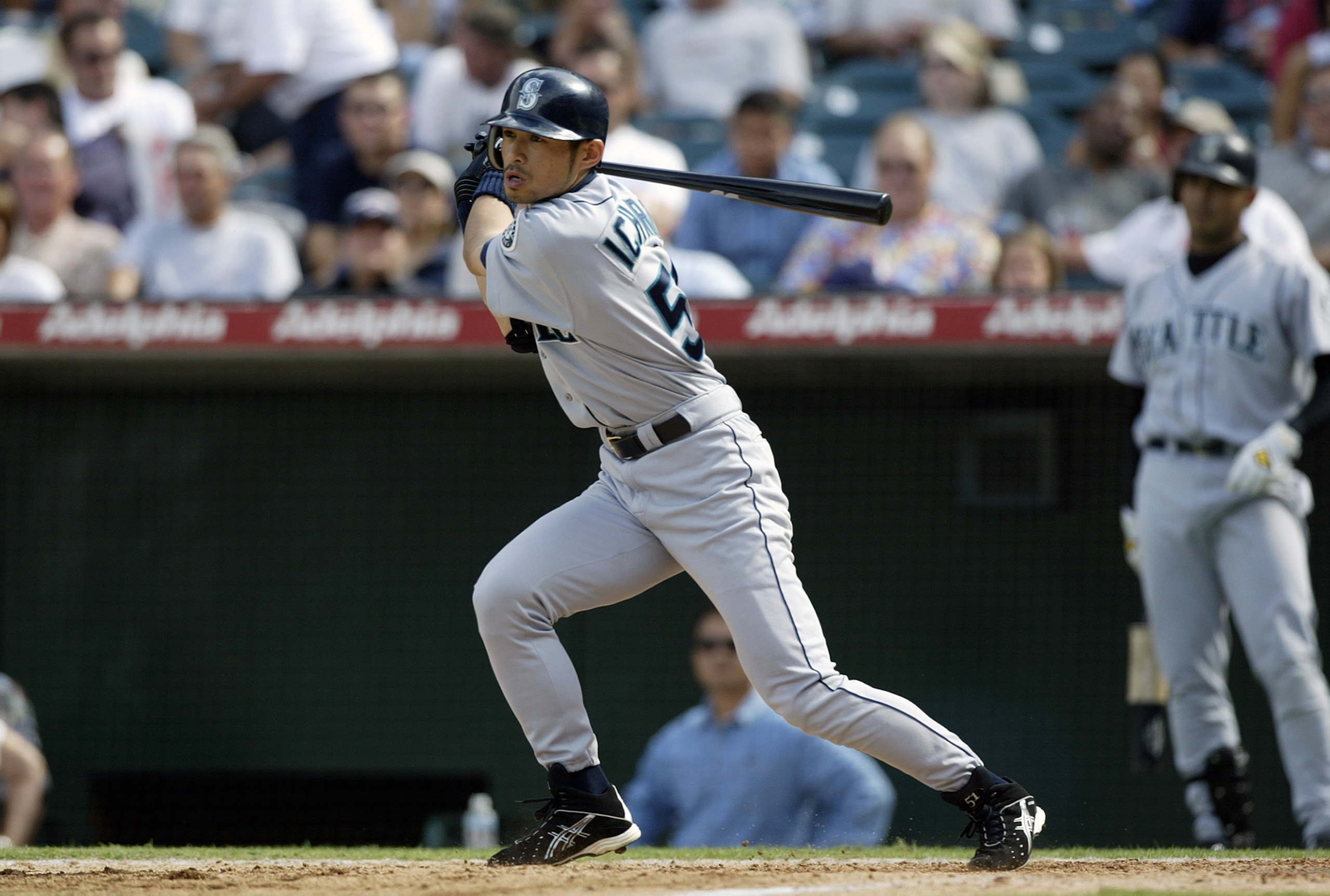 ANAHEIM, CA - SEPTEMBER 24:  Ichiro Suzuki of the Seattle Mariners hits a single off of John Lackey of the Anaheim Angels in the top of the ninth inning on September 24, 2003 at Edison Field in Anaheim, California.  The Angels defeated the Mariners 4-0.