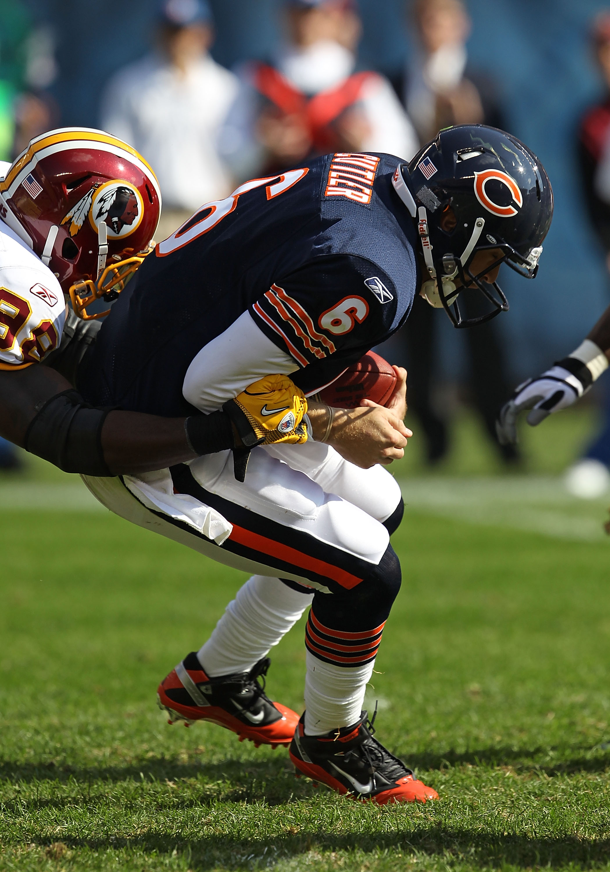 CHICAGO - OCTOBER 24: Jay Cutler #6 of the Chicago Bears is sacked by Brian Orakpo #98 of the Washington Redskins at Soldier Field on October 24, 2010 in Chicago, Illinois. The Redskins defeated the Bears 17-14. (Photo by Jonathan Daniel/Getty Images)