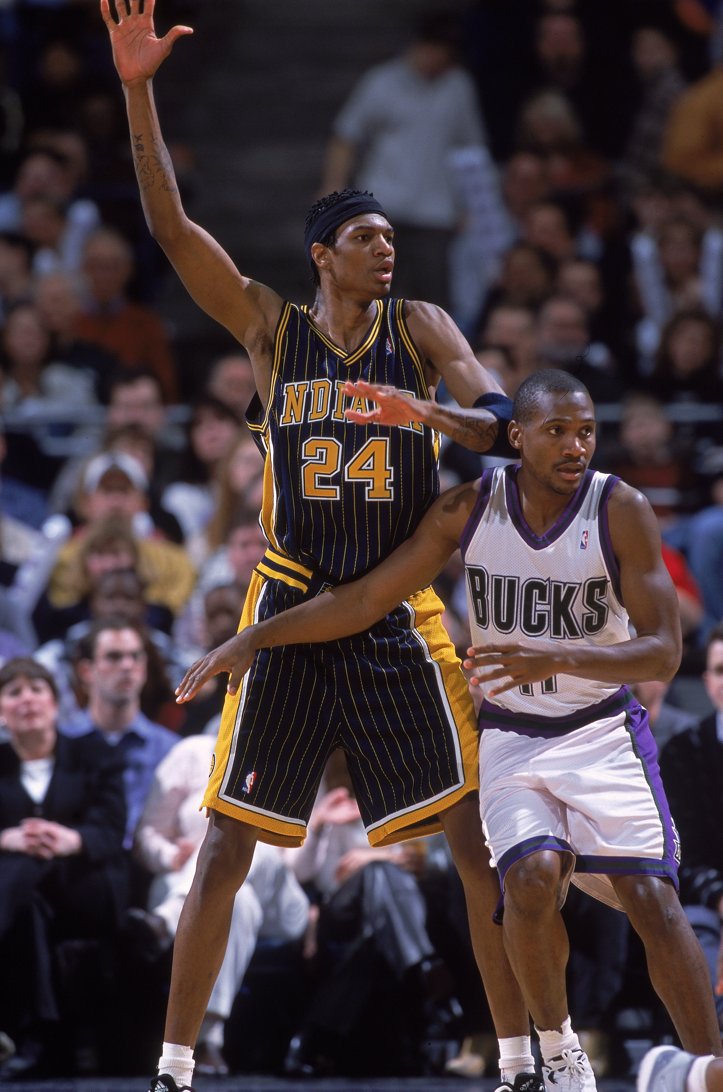 3 Feb 2001:  Jonathan Bender #24 of the Indiana Pacers waves to prove he is open against Lindsey Hunter #11 of the Milwaukee Bucks during the game at the Bradley Center in Milwaukee, Wisconsin. The Bucks defeated the Pacers 104-85.  NOTE TO USER: It is ex