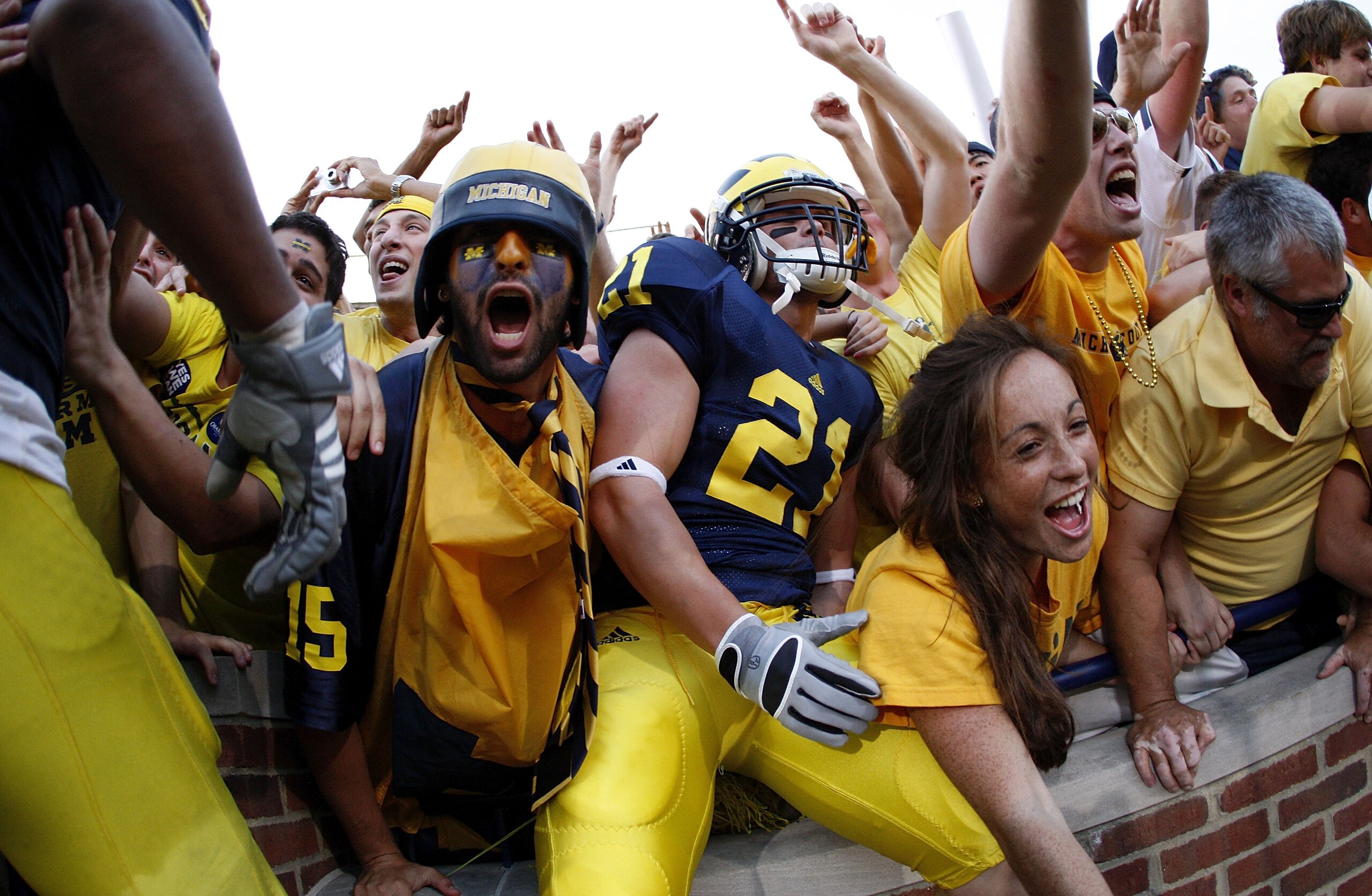 ANN ARBOR, MI - SEPTEMBER 27:  Jordan Reilly #21 of the Michigan Wolverines and fans celebrate their victory over the Wisconsin Badgers on September 27, 2008 at Michigan Stadium in Ann Arbor, Michigan.  (Photo by Gregory Shamus/Getty Images)