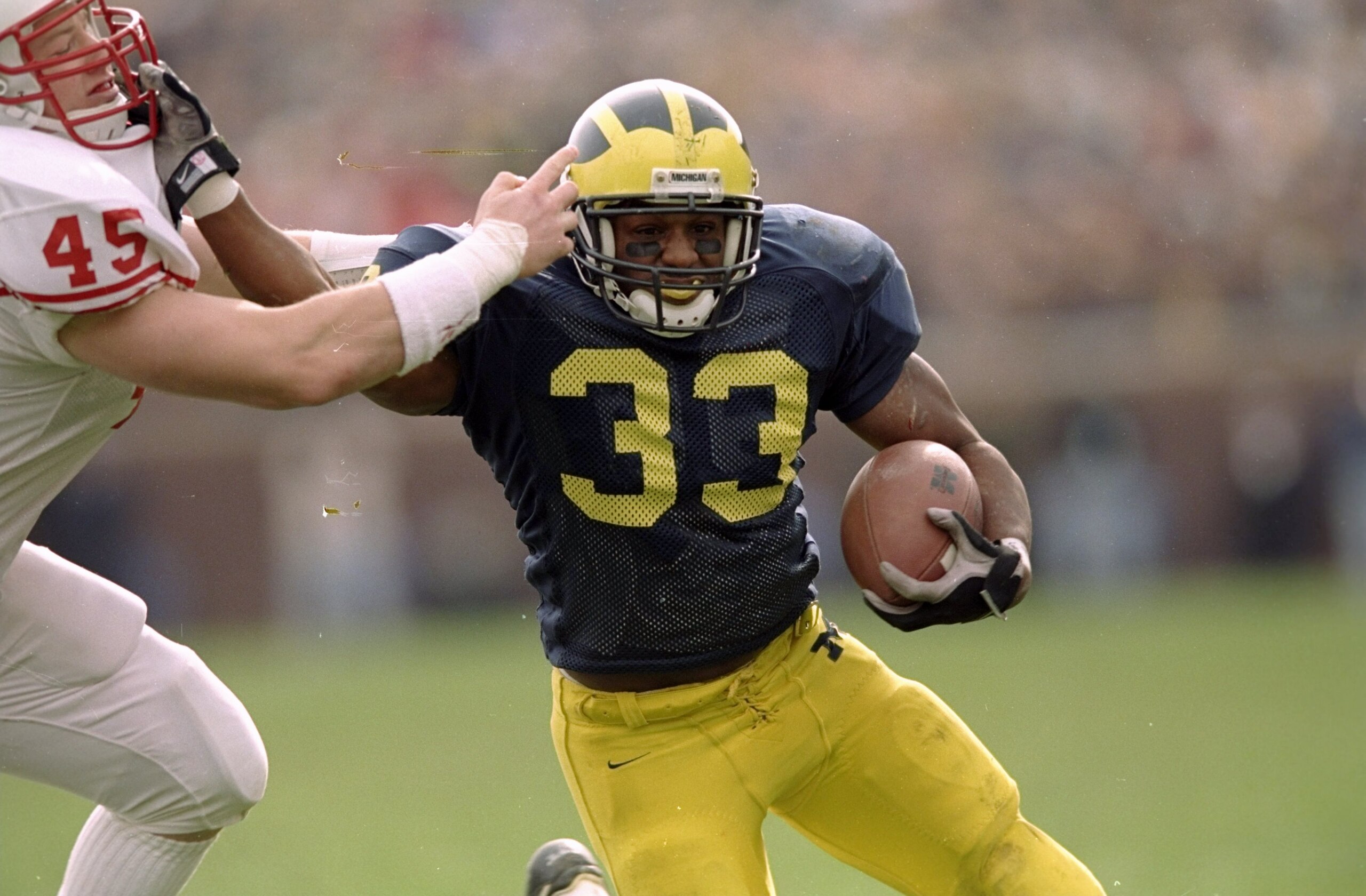 14 Nov 1998:  Running back Clarence Williams #33 of the Michigan Wolverines in action during the game against the Wisconsin Badgers at the Michigan Stadium in Ann Arbor, Michigan. The Wolverines defeated the Badgers 27-10. Mandatory Credit: Vincent Lafore