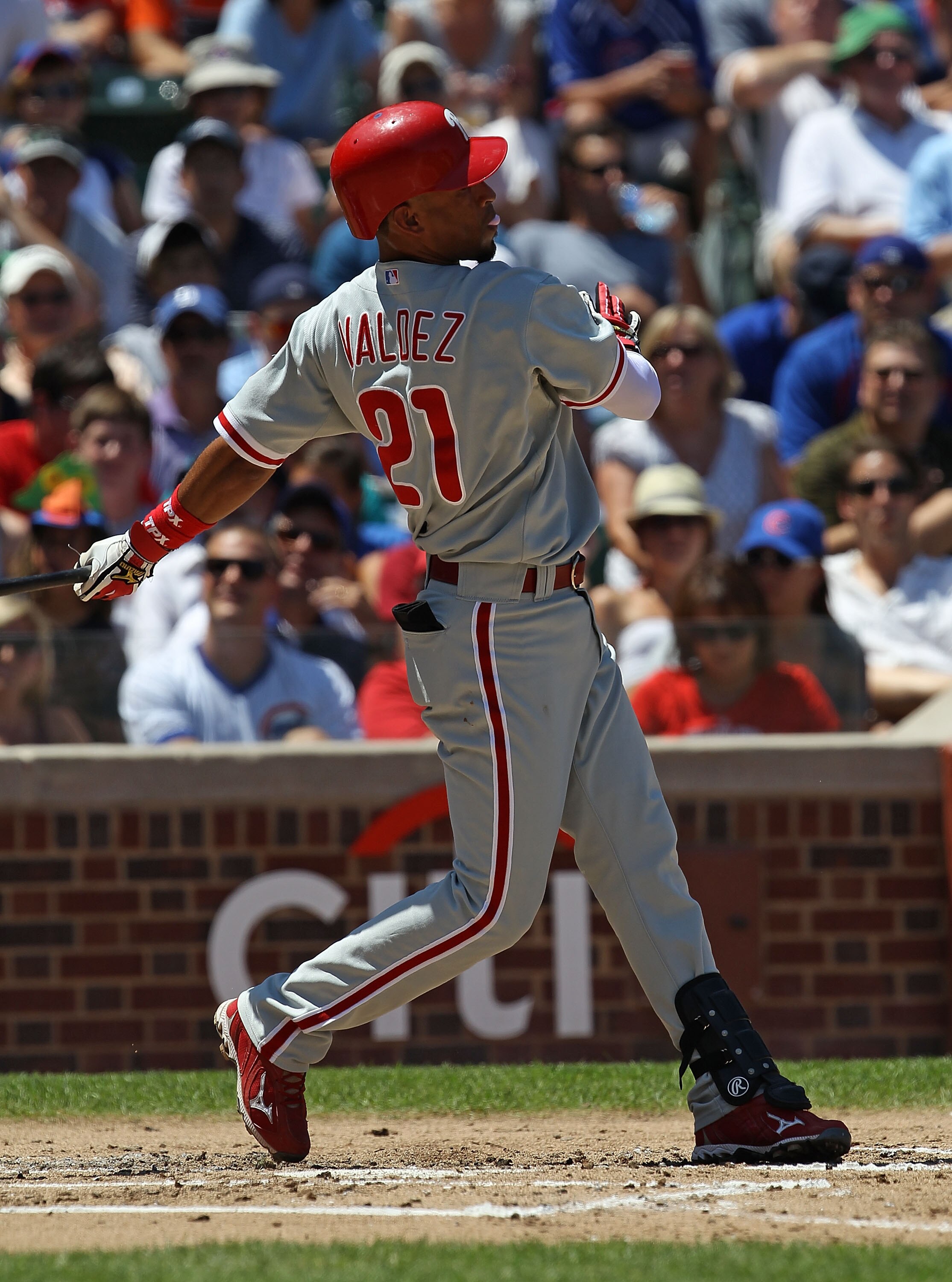 CHICAGO - JULY 16: Wilson Valdez #21 of the Philadelphia Phillies takes a swing against the Chicago Cubs at Wrigley Field on July 16, 2010 in Chicago, Illinois. The Cubs defeated the Phillies 4-3. (Photo by Jonathan Daniel/Getty Images)