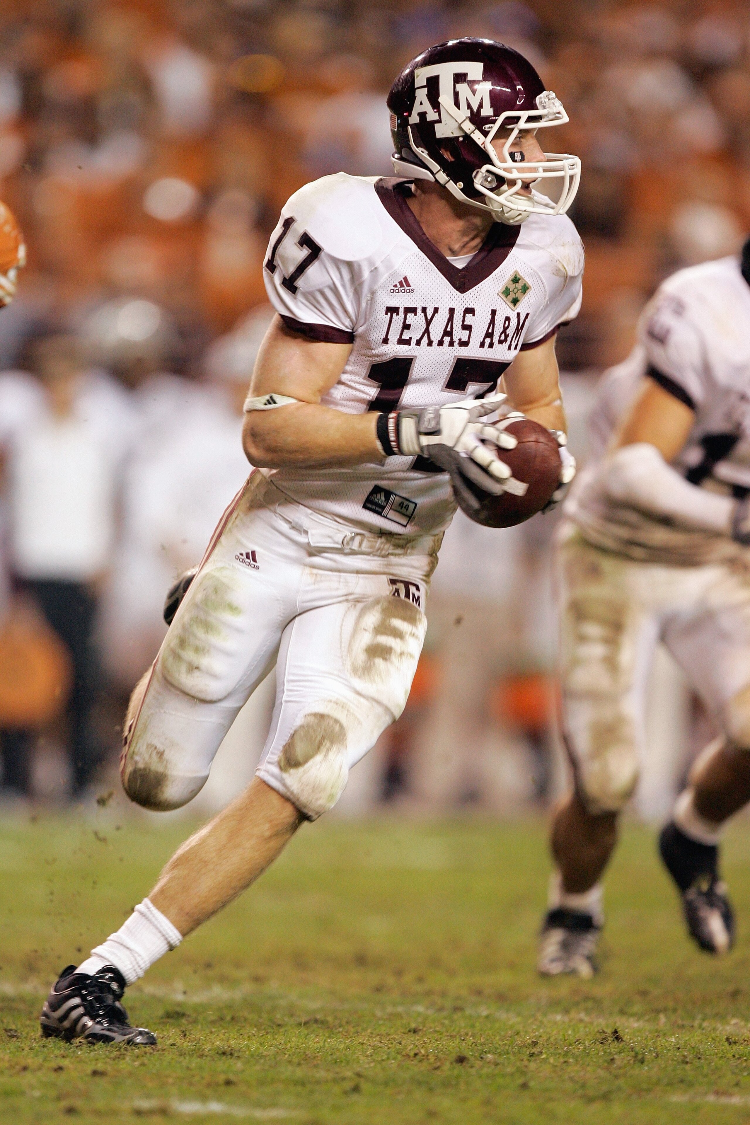 AUSTIN, TX - NOVEMBER 27: Quarterback  Ryan Tannehill #17 of the Texas A&M Aggies runs the ball against the Texas Longhorns on November 27, 2008 at Darrell K Royal-Texas Memorial Stadium in Austin, Texas.  Texas won 49-9. (Photo by Brian Bahr/Getty Images