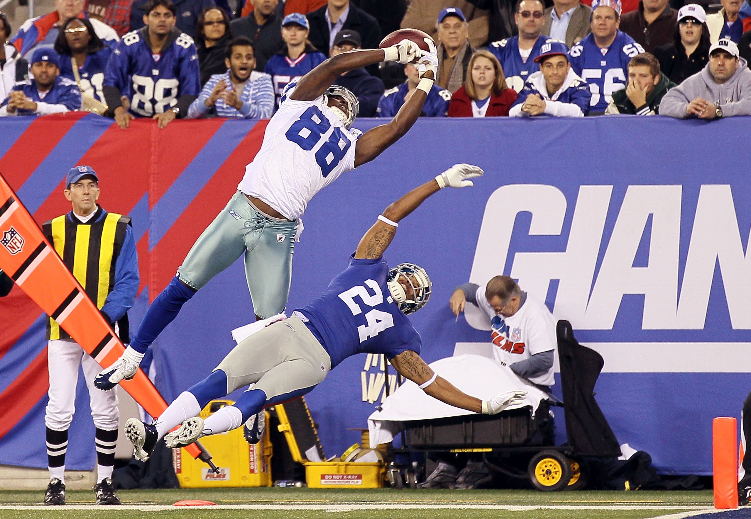 EAST RUTHERFORD, NJ - NOVEMBER 14: Dez Bryant #88 of the Dallas Cowboys hauls in a first quarter touchdown reception against Terrell Thomas #24 of the New York Giants on November 14, 2010 at the New Meadowlands Stadium in East Rutherford, New Jersey. (P EAST RUTHERFORD, NJ - NOVEMBER 14: Dez Bryant #88 of the Dallas Cowboys hauls in a first quarter touchdown reception against Terrell Thomas #24 of the New York Giants on November 14, 2010 at the New Meadowlands Stadium in East Rutherford, New Jersey. (P