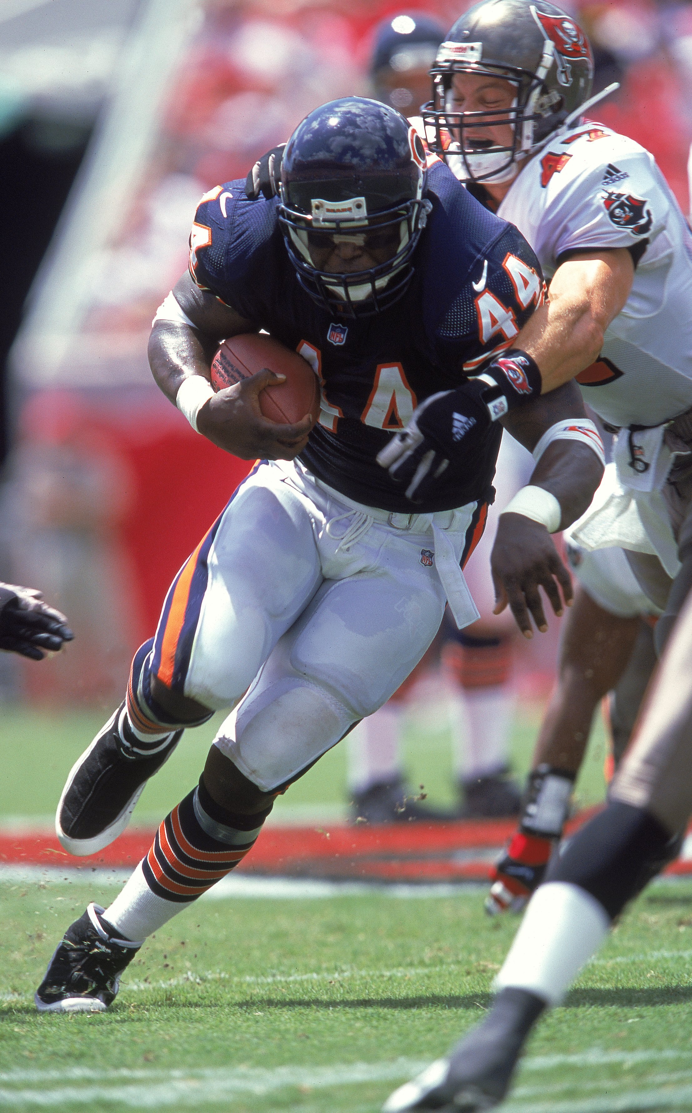 10 Sep 2000:  Curtis Enis #44 of the Chicago Bears breaks out of John Lynch #47 of the Tampa Bay Buccaneers (L-R) grasp during the game at the Raymond James Stadium in Tampa, Florida.  The Buccaneers defeated the bears 40-0.Mandatory Credit: Andy Lyons  /