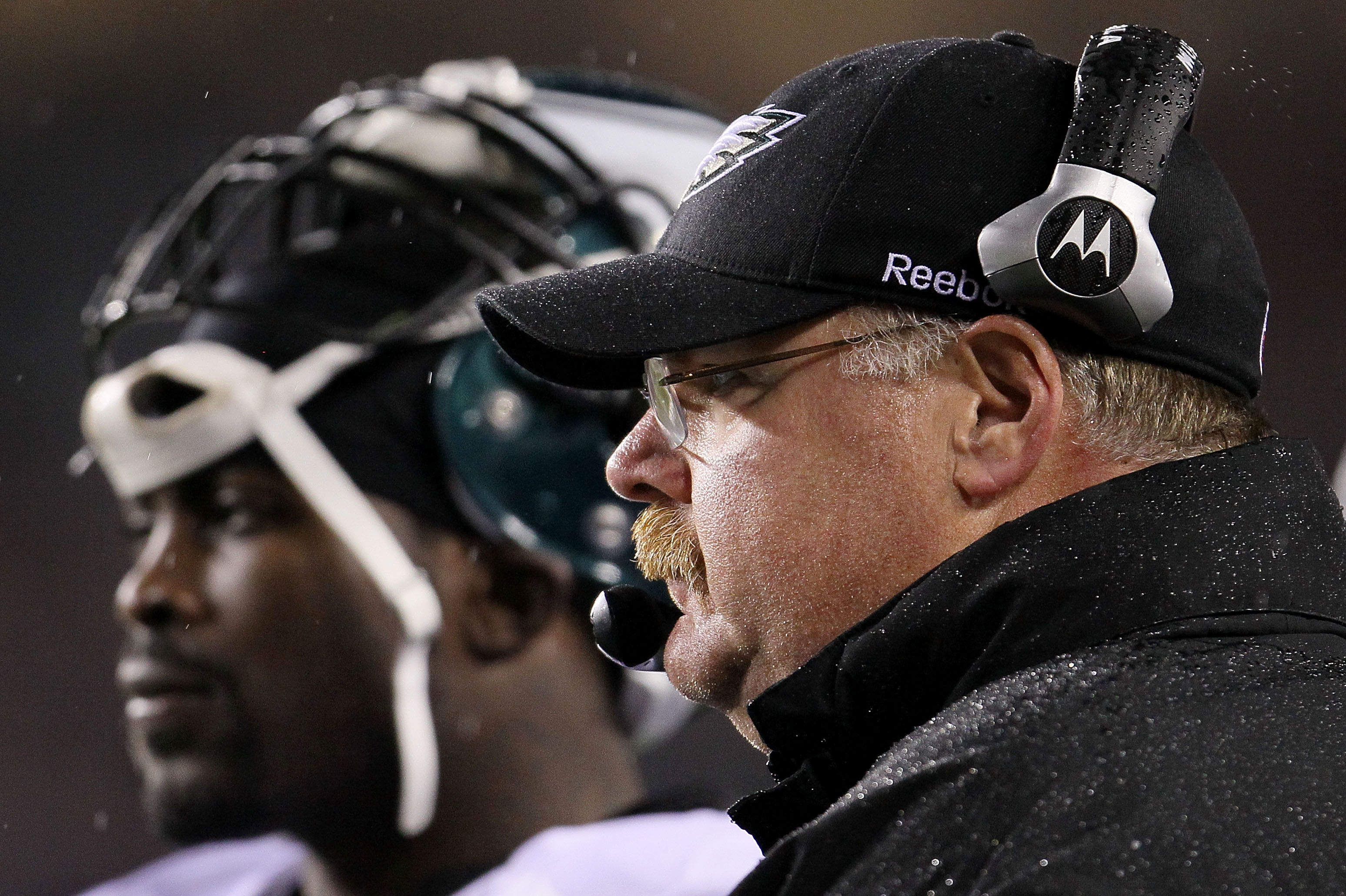 LANDOVER, MD - NOVEMBER 15: Head coach Andy Reid of the Philadelphia Eagles and quarterback   Michael Vick #7  wait for a review to be completed against  the Washington Redskins on November 15, 2010 at FedExField in Landover, Maryland.  (Photo by Chris Mc