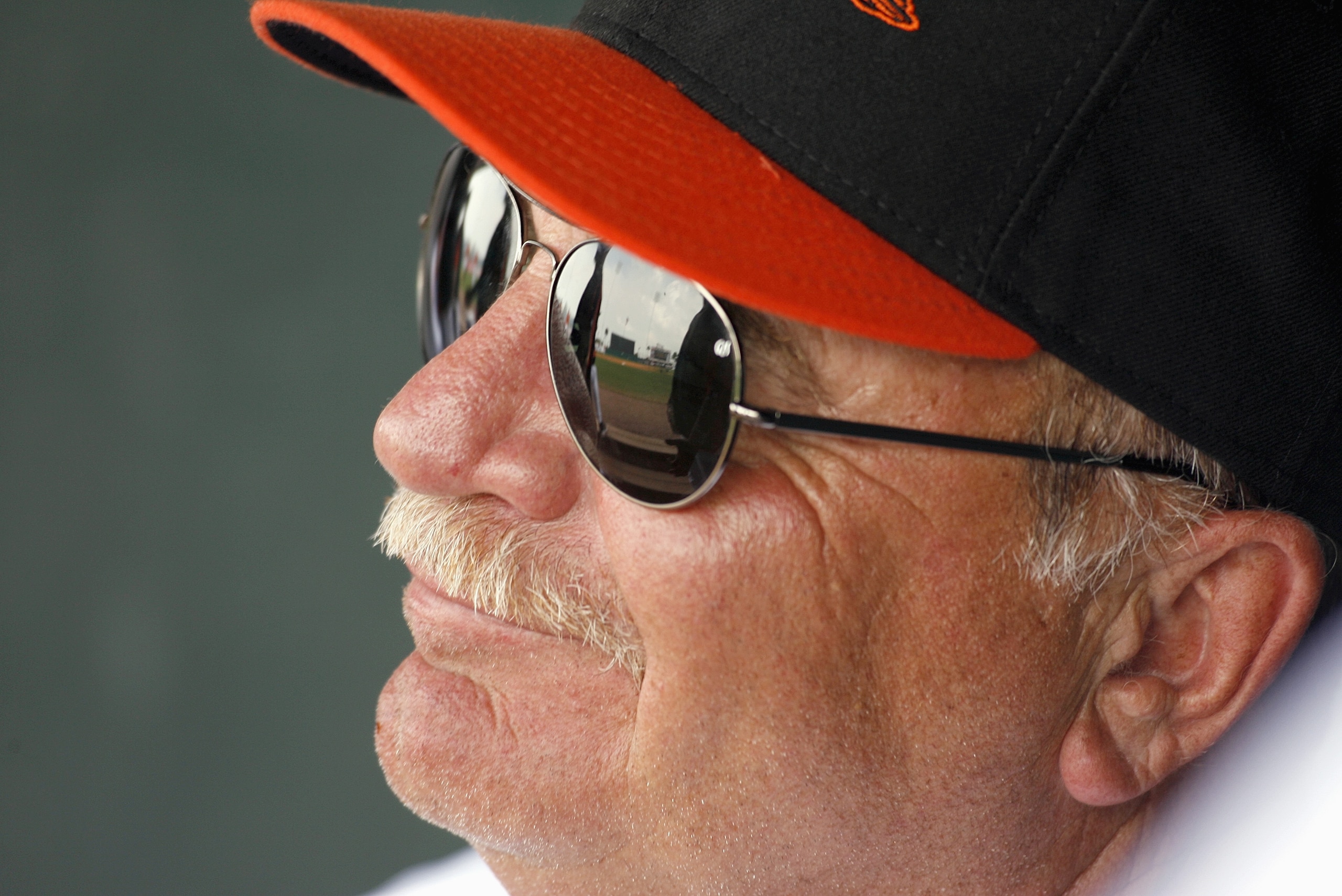 FT. LAUDERDALE, FL - MARCH 2: Pitching Coach Leo Mazzone #54 of the Baltimore Orioles smiles in the dugout against the Florida Marlins at Ft. Lauderdale Stadium during spring training March 2, 2007 in Ft. Lauderdale, Florida. (Photo by Marc Serota/Getty I FT. LAUDERDALE, FL - MARCH 2: Pitching Coach Leo Mazzone #54 of the Baltimore Orioles smiles in the dugout against the Florida Marlins at Ft. Lauderdale Stadium during spring training March 2, 2007 in Ft. Lauderdale, Florida. (Photo by Marc Serota/Getty I