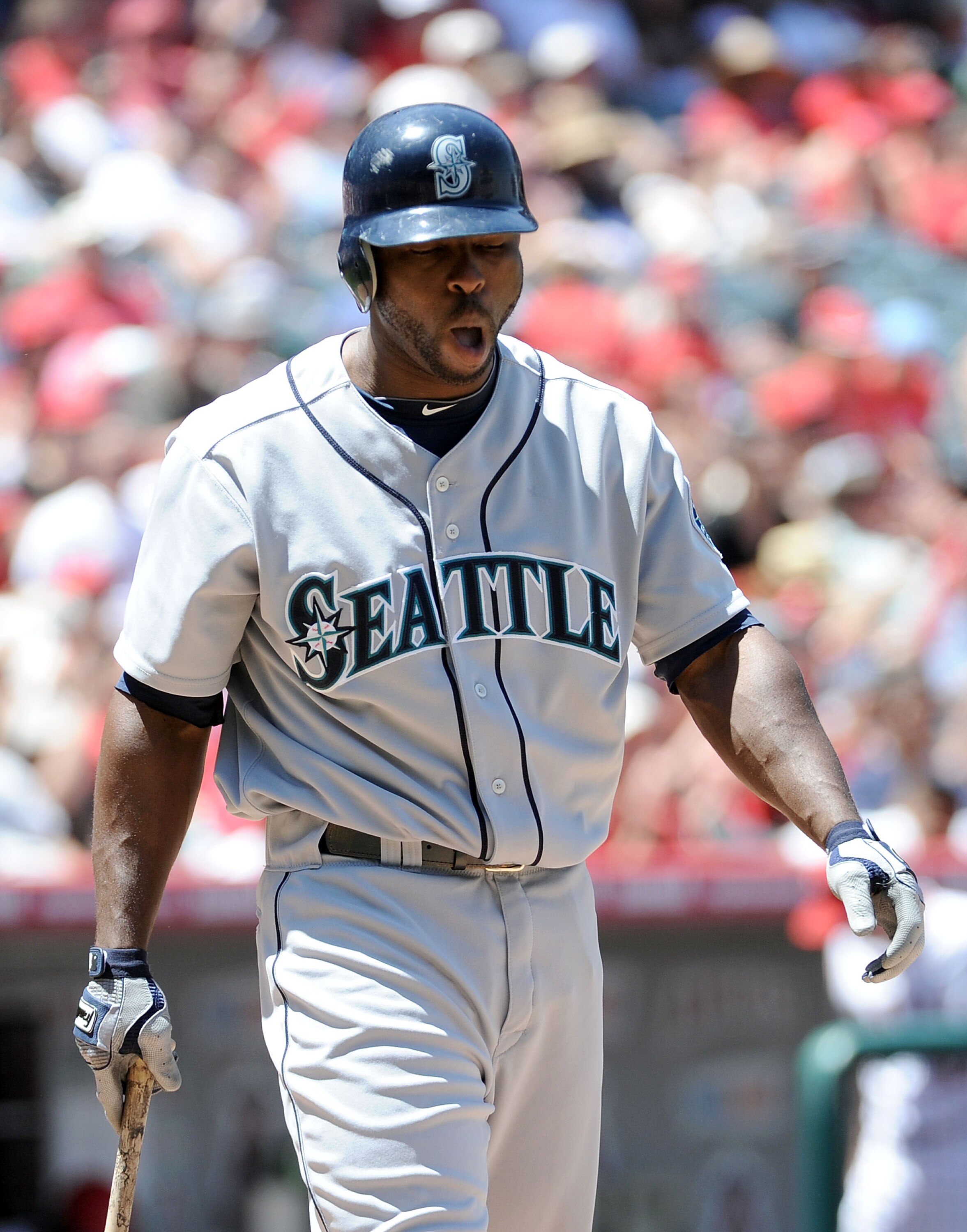 ANAHEIM, CA - MAY 29:  Milton Bradley #15 of the Seattle Mariners reacts after his strikeout with men in scoring position against the Los Angeles Angels during the third inning at Angel Stadium on May 29, 2010 in Anaheim, California.  (Photo by Harry How/
