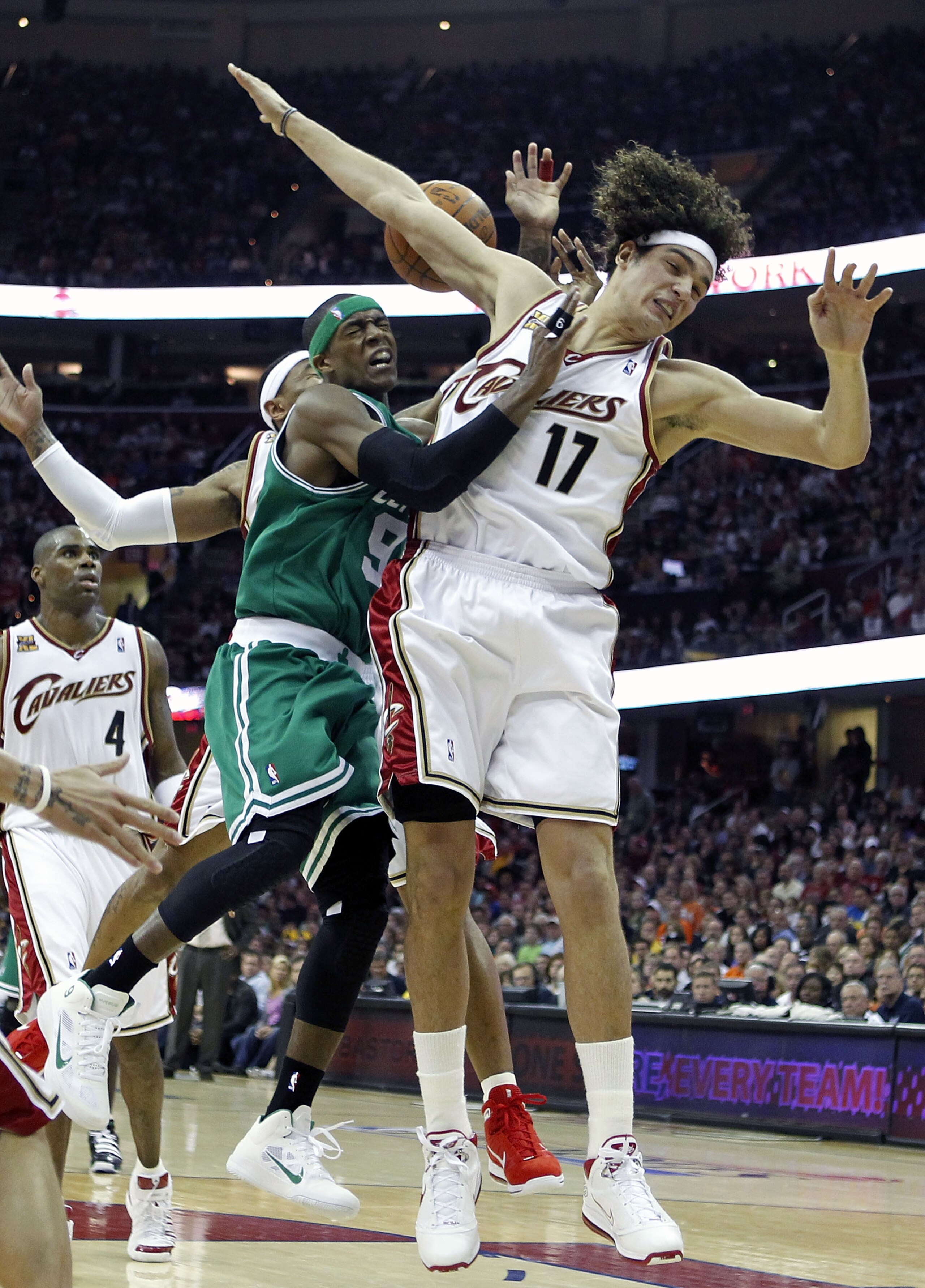 CLEVELAND - MAY 01: Rajon Rondo #9 of the Boston Celtics tries to get a shot off between Mo Williams #2 and Anderson Varejao #17 of the Cleveland Cavaliers in Game One of the Eastern Conference Semifinals during the 2010 NBA Playoffs at Quicken Loans Are CLEVELAND - MAY 01: Rajon Rondo #9 of the Boston Celtics tries to get a shot off between Mo Williams #2 and Anderson Varejao #17 of the Cleveland Cavaliers in Game One of the Eastern Conference Semifinals during the 2010 NBA Playoffs at Quicken Loans Are