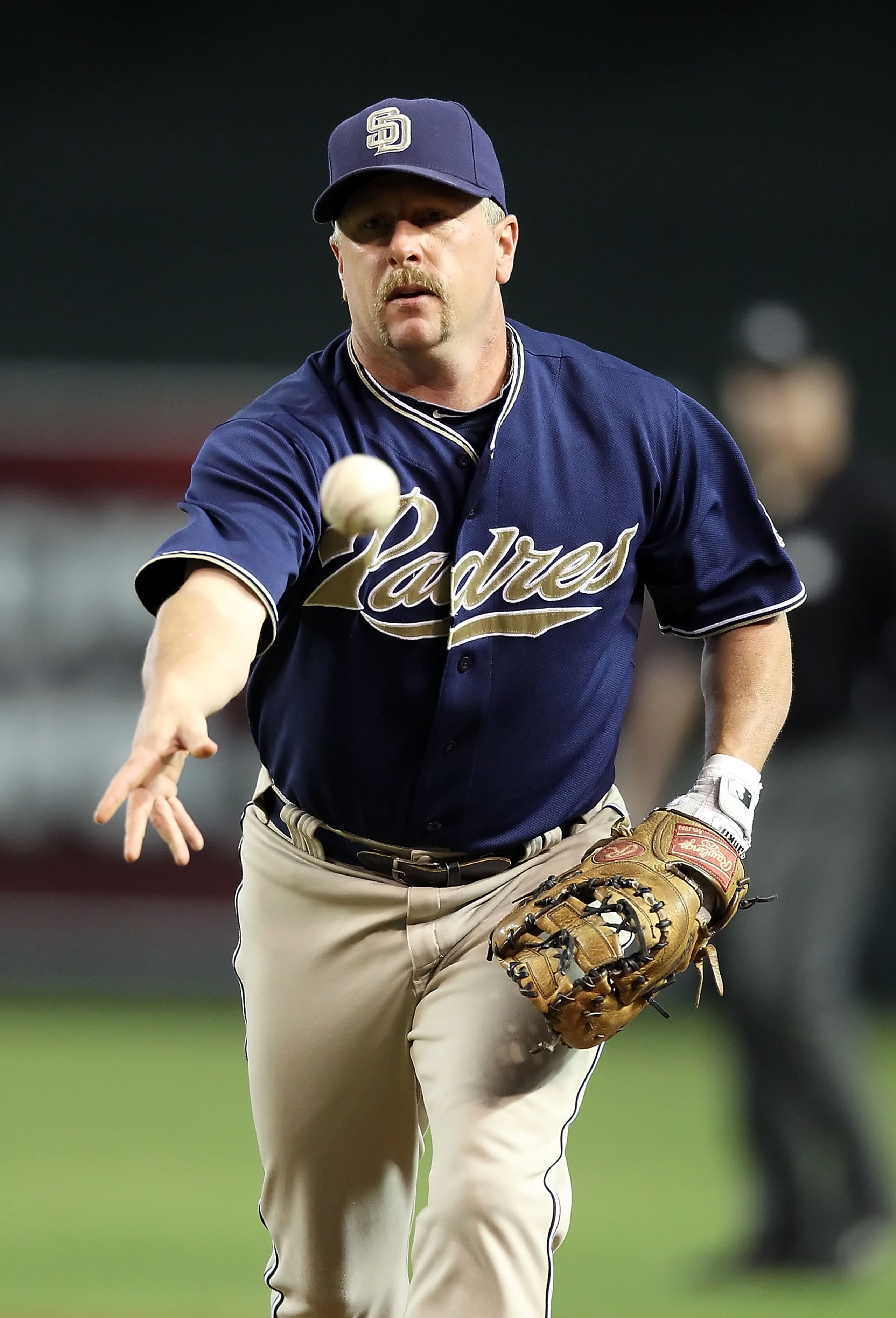 PHOENIX - AUGUST 08: Infielder Matt Stairs #16 of the San Diego Padres fields a ground ball out agianst the Arizona Diamondbacks during the Major League Baseball game at Chase Field on August 8, 2010 in Phoenix, Arizona. (Photo by Christian Petersen/Get PHOENIX - AUGUST 08: Infielder Matt Stairs #16 of the San Diego Padres fields a ground ball out agianst the Arizona Diamondbacks during the Major League Baseball game at Chase Field on August 8, 2010 in Phoenix, Arizona. (Photo by Christian Petersen/Get