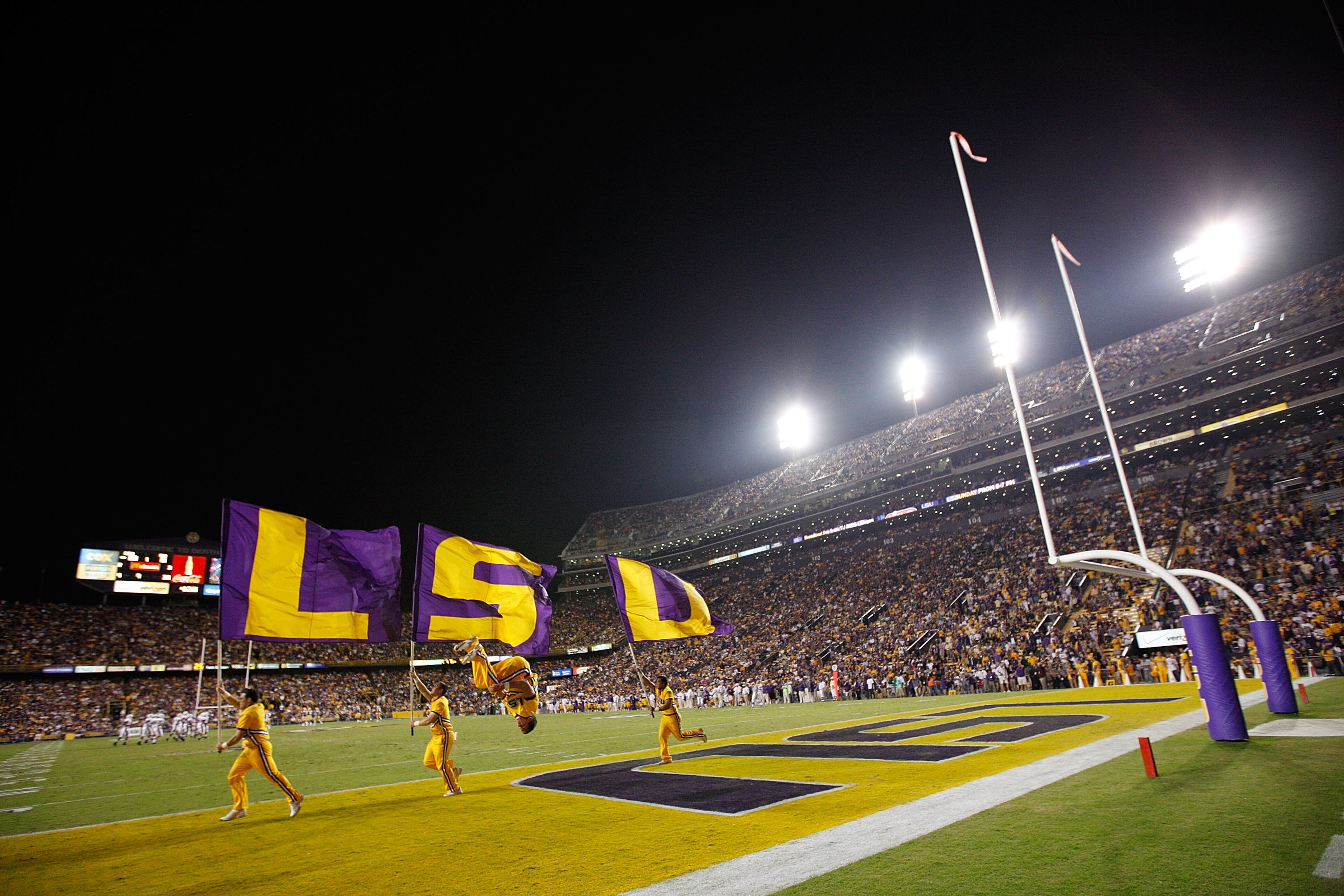 BATON ROUGE, LA - NOVEMBER 13:  Members of the Louisiana State University Tigers cheerleaders celebrate after a touchdown during the game against the University of Louisiana-Monroe Warhawks at Tiger Stadium on November 13, 2010 in Baton Rouge, Louisiana.