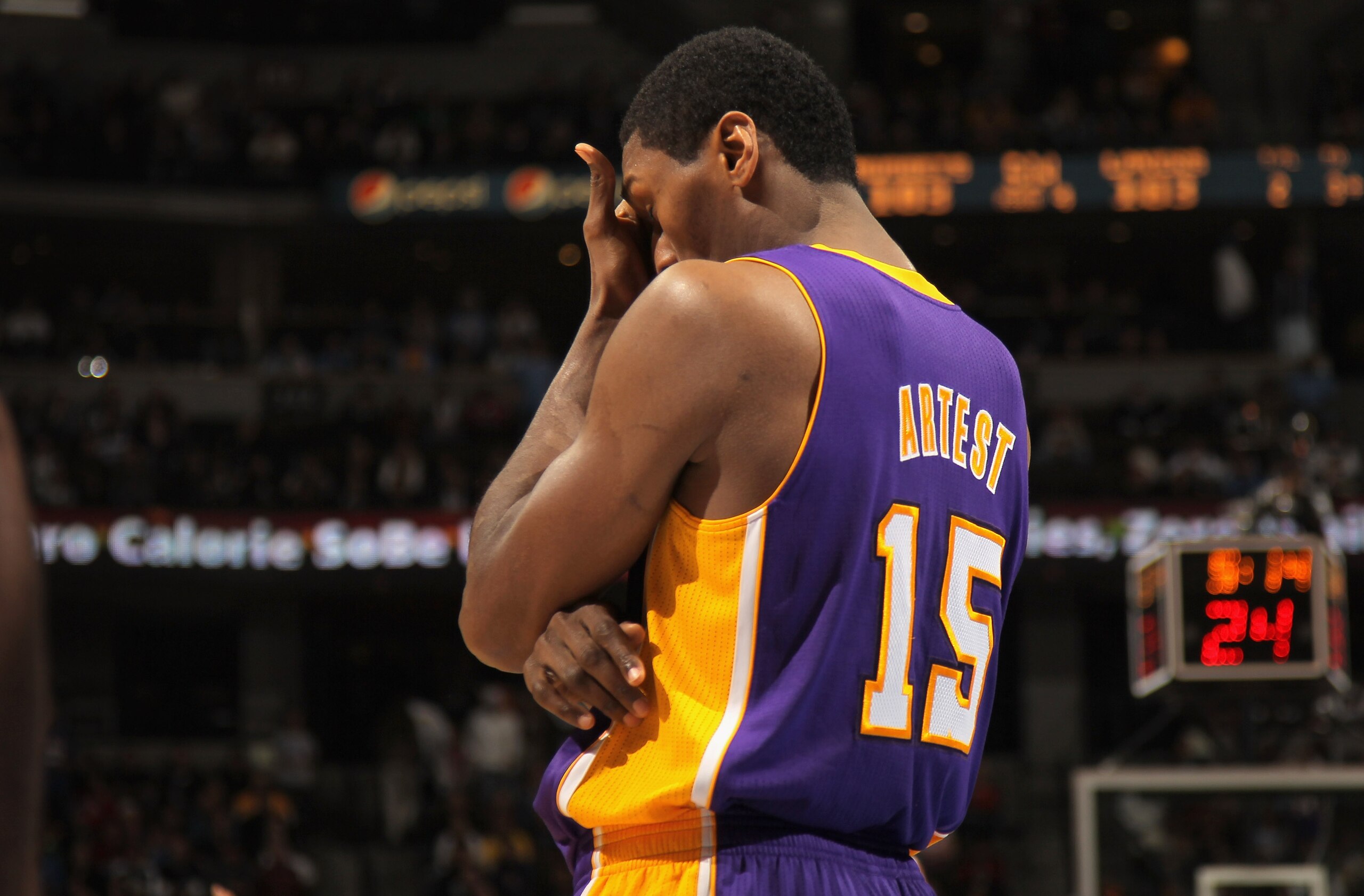 DENVER - NOVEMBER 11: Ron Artest #15 of the Los Angeles Lakers reacts after being called for a foul against the Denver Nuggets at the Pepsi Center on November 11, 2010 in Denver, Colorado. The Nuggets defeated the Lakers 118-112. NOTE TO USER: User expr DENVER - NOVEMBER 11: Ron Artest #15 of the Los Angeles Lakers reacts after being called for a foul against the Denver Nuggets at the Pepsi Center on November 11, 2010 in Denver, Colorado. The Nuggets defeated the Lakers 118-112. NOTE TO USER: User expr