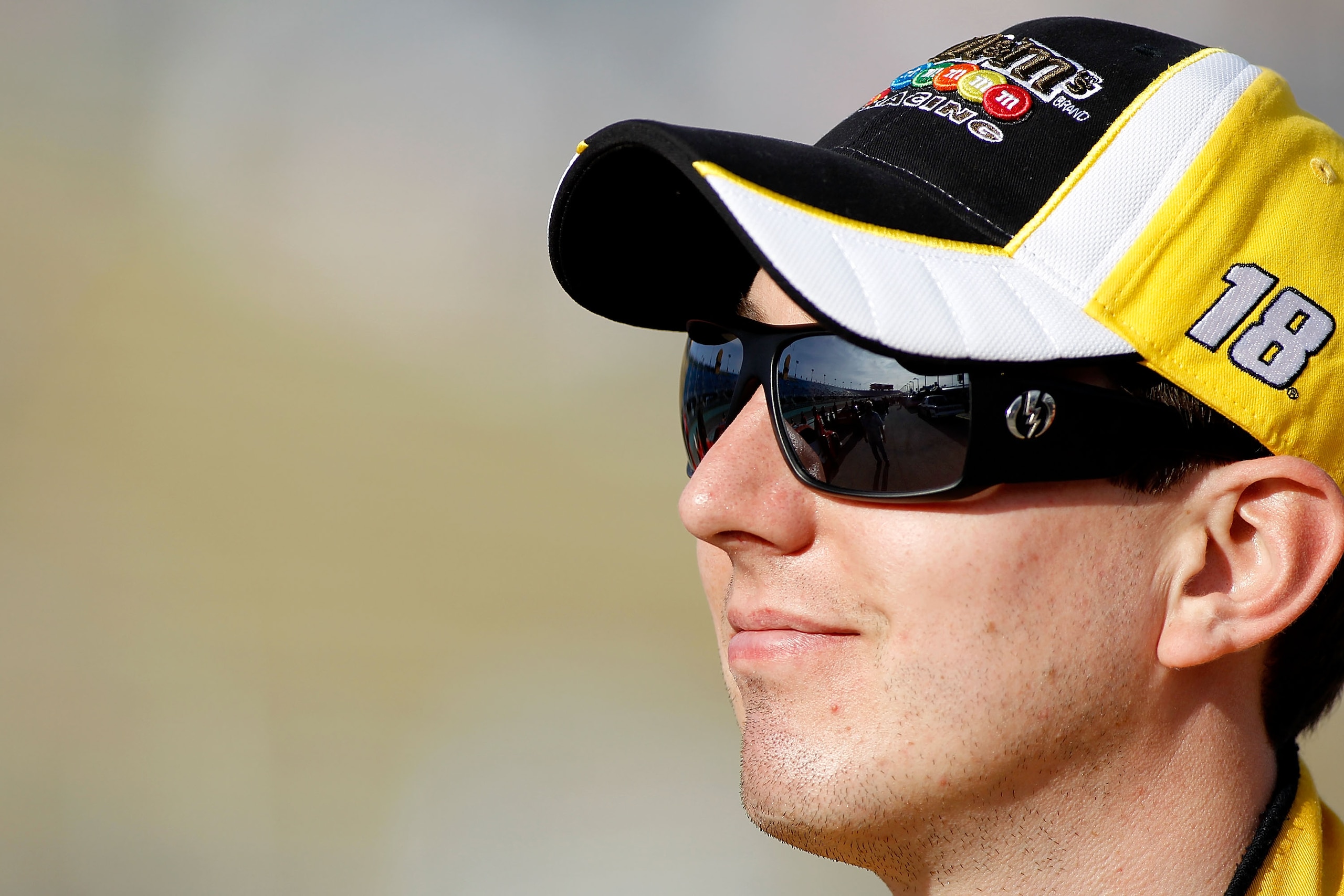 HOMESTEAD, FL - NOVEMBER 19: Kyle Busch, driver of the #18 M&M'sToyota, stands on pit road during qualifying for the NASCAR Sprint Cup Series Ford 400 at Homestead-Miami Speedway on November 19, 2010 in Homestead, Florida. (Photo by Todd Warshaw/Getty I HOMESTEAD, FL - NOVEMBER 19: Kyle Busch, driver of the #18 M&M'sToyota, stands on pit road during qualifying for the NASCAR Sprint Cup Series Ford 400 at Homestead-Miami Speedway on November 19, 2010 in Homestead, Florida. (Photo by Todd Warshaw/Getty I