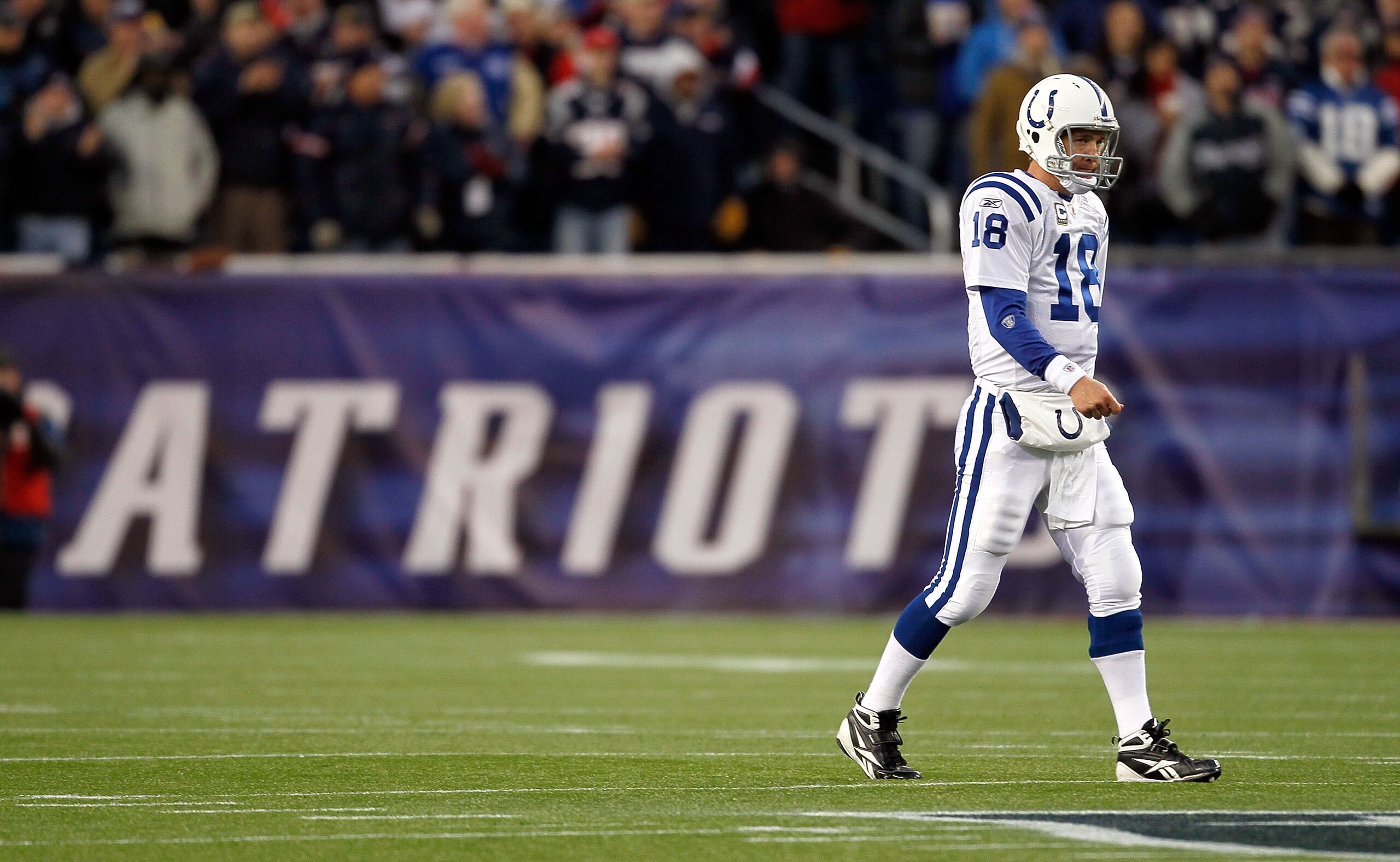 FOXBORO, MA - NOVEMBER 21:  Peyton Manning #18 of the Indianapolis Colts walks to the sideline in first half in a game against the New England Patriots at Gillette Stadium on November 21, 2010 in Foxboro, Massachusetts. The Patriots won 31-28. (Photo by J