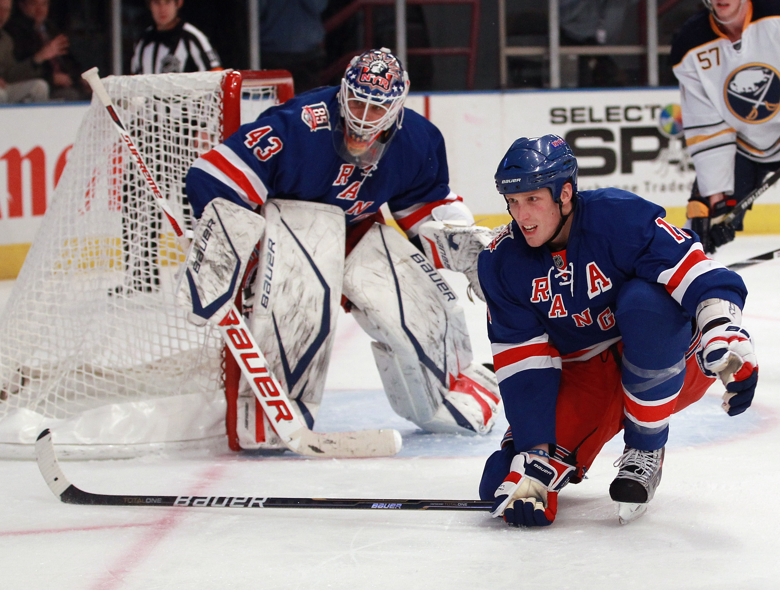 NEW YORK - NOVEMBER 11:  Goaltender Martin Biron #43 and Marc Staal #18 of the New York Rangers defend against the Buffalo Sabres at Madison Square Garden on November 11, 2010 in New York City. The Rangers defeated the Sabres 3-2 in overtime.  (Photo by B