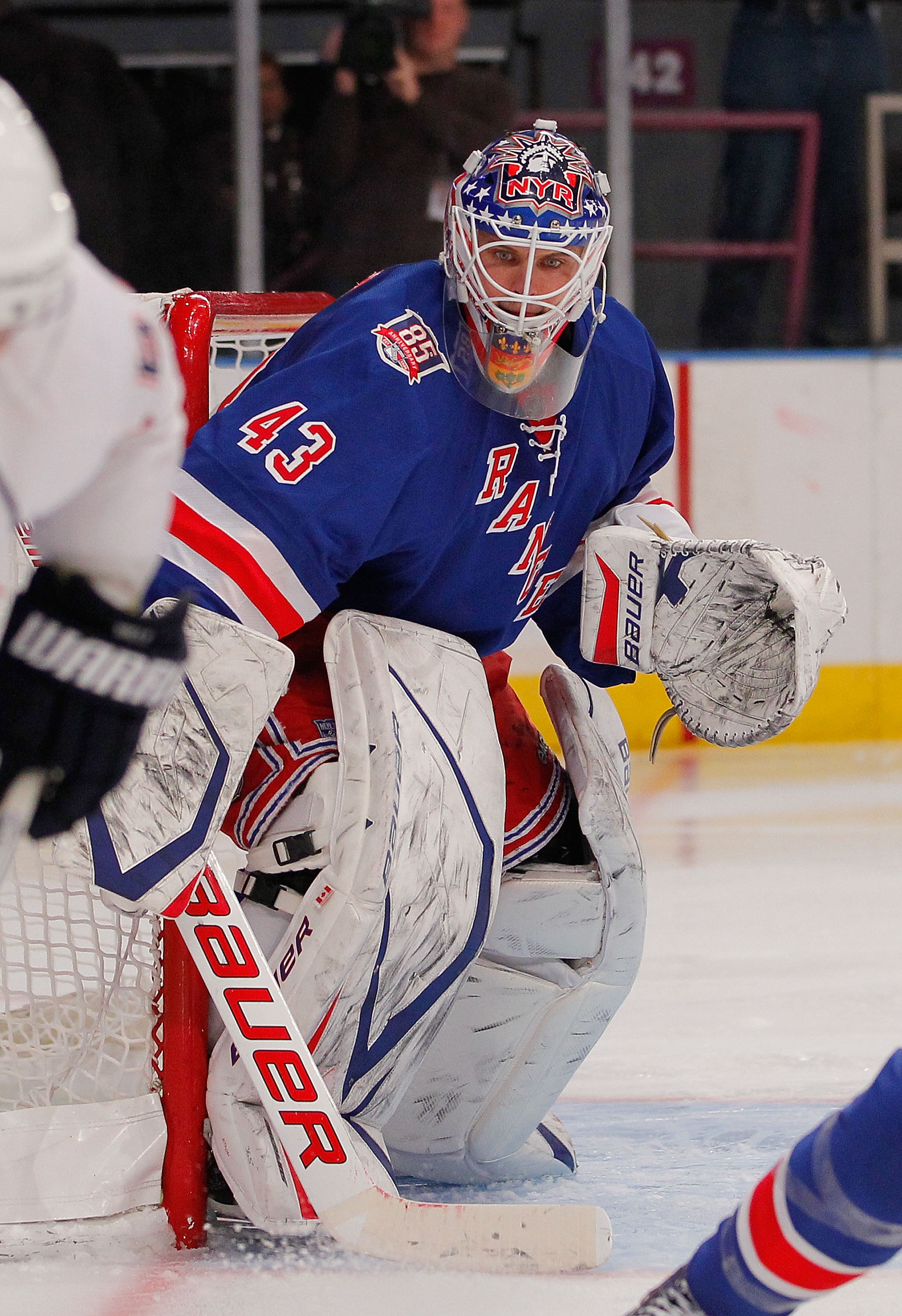 NEW YORK - NOVEMBER 14:  Goalie Martin Biron #43 of the New York Rangers keeps an eye on the puck during a hockey game against the Edmonton Oilers at Madison Square Garden on November 14, 2010 in New York City.  (Photo by Paul Bereswill/Getty Images)