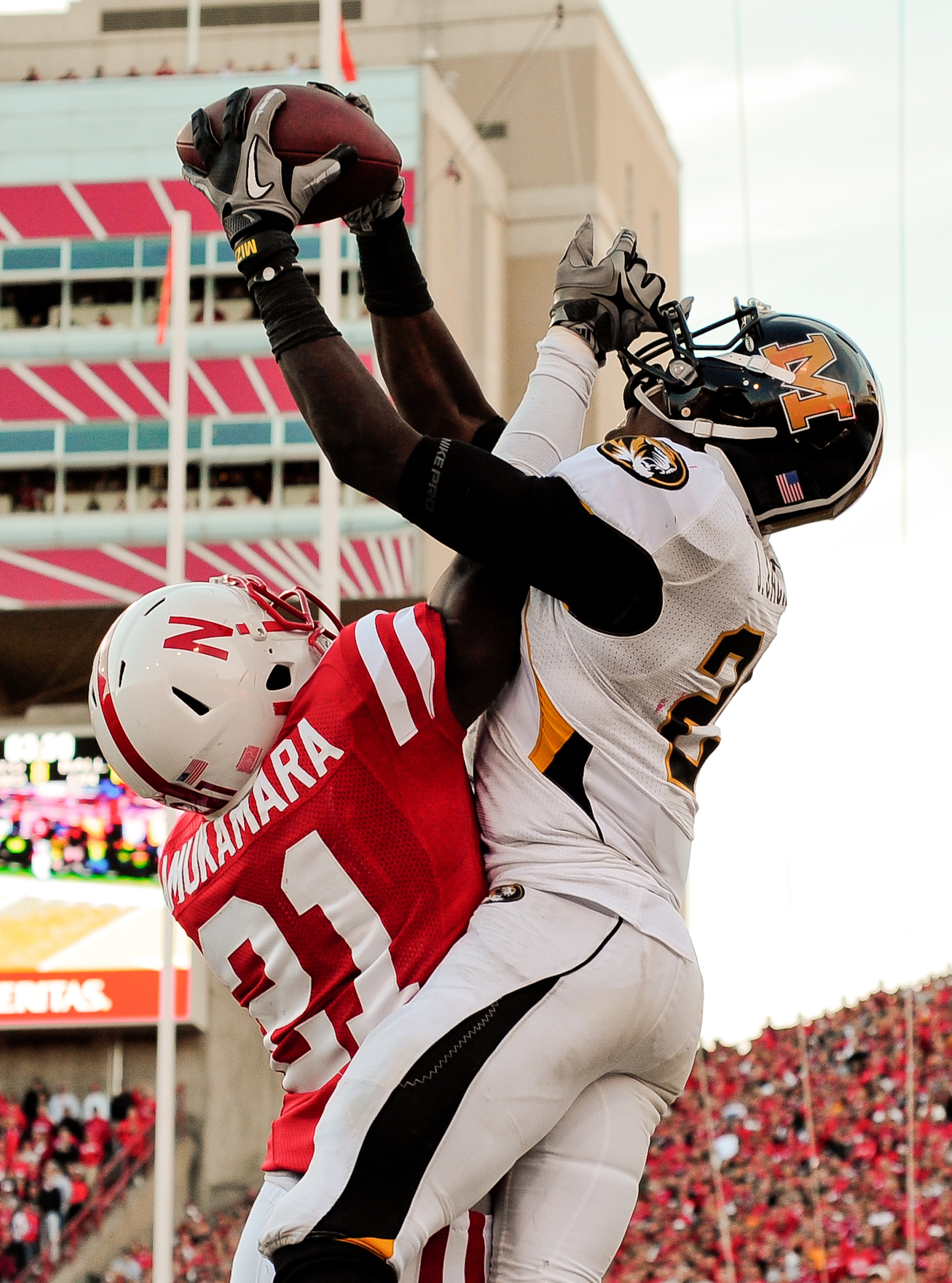 LINCOLN, NE - OCTOBER 30: Cornerback Prince Amukamara #21 of the Nebraska Cornhuskers breaks up a intended for wide receiver L'Damian Washington #2 of the Missouri Tigers during second half action of their game at Memorial Stadium on October 30, 2010 in L