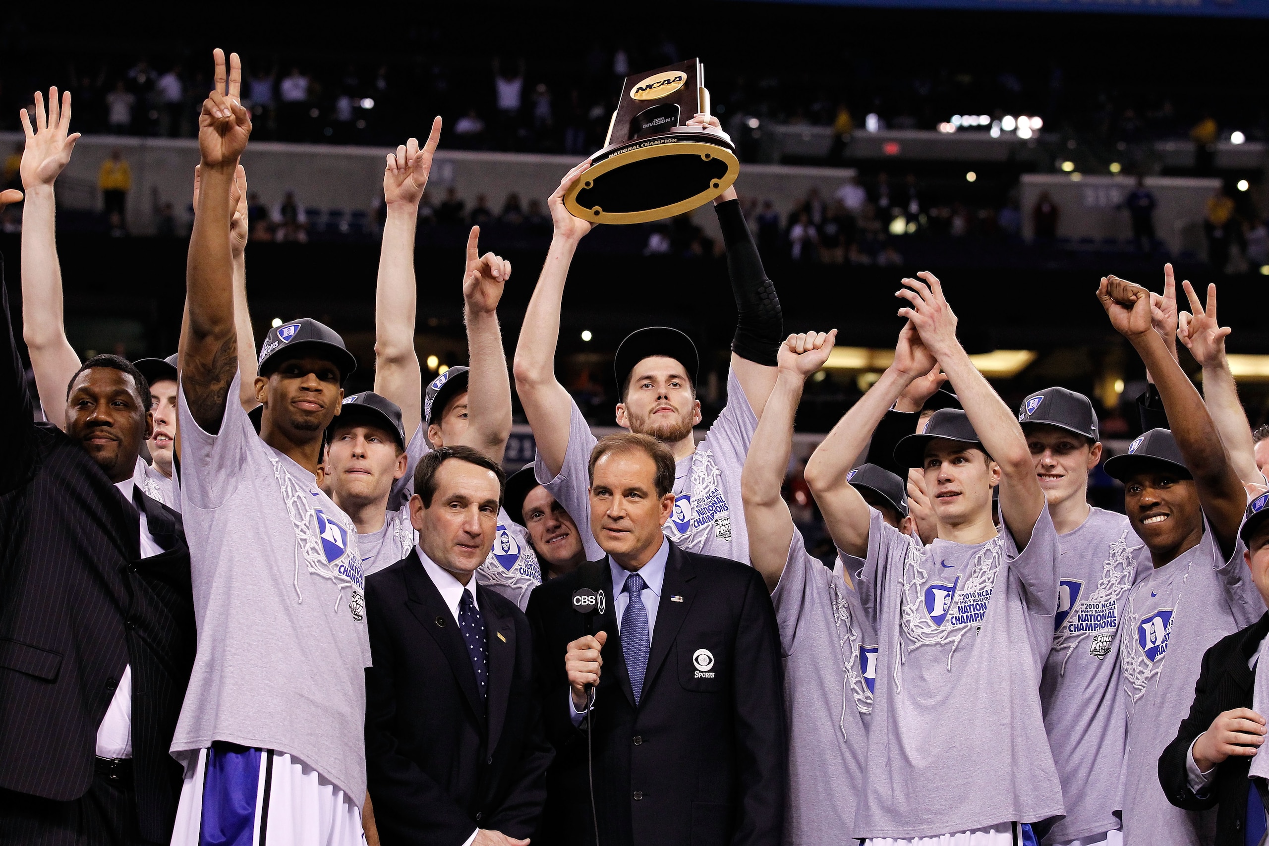 INDIANAPOLIS - APRIL 05: Head coach Mike Krzyzewski of the Duke Blue Devils celebrates after he cut down a piece of the net following their 61-59 win against the Butler Bulldogs during the 2010 NCAA Division I Men's Basketball National Championship game INDIANAPOLIS - APRIL 05: Head coach Mike Krzyzewski of the Duke Blue Devils celebrates after he cut down a piece of the net following their 61-59 win against the Butler Bulldogs during the 2010 NCAA Division I Men's Basketball National Championship game