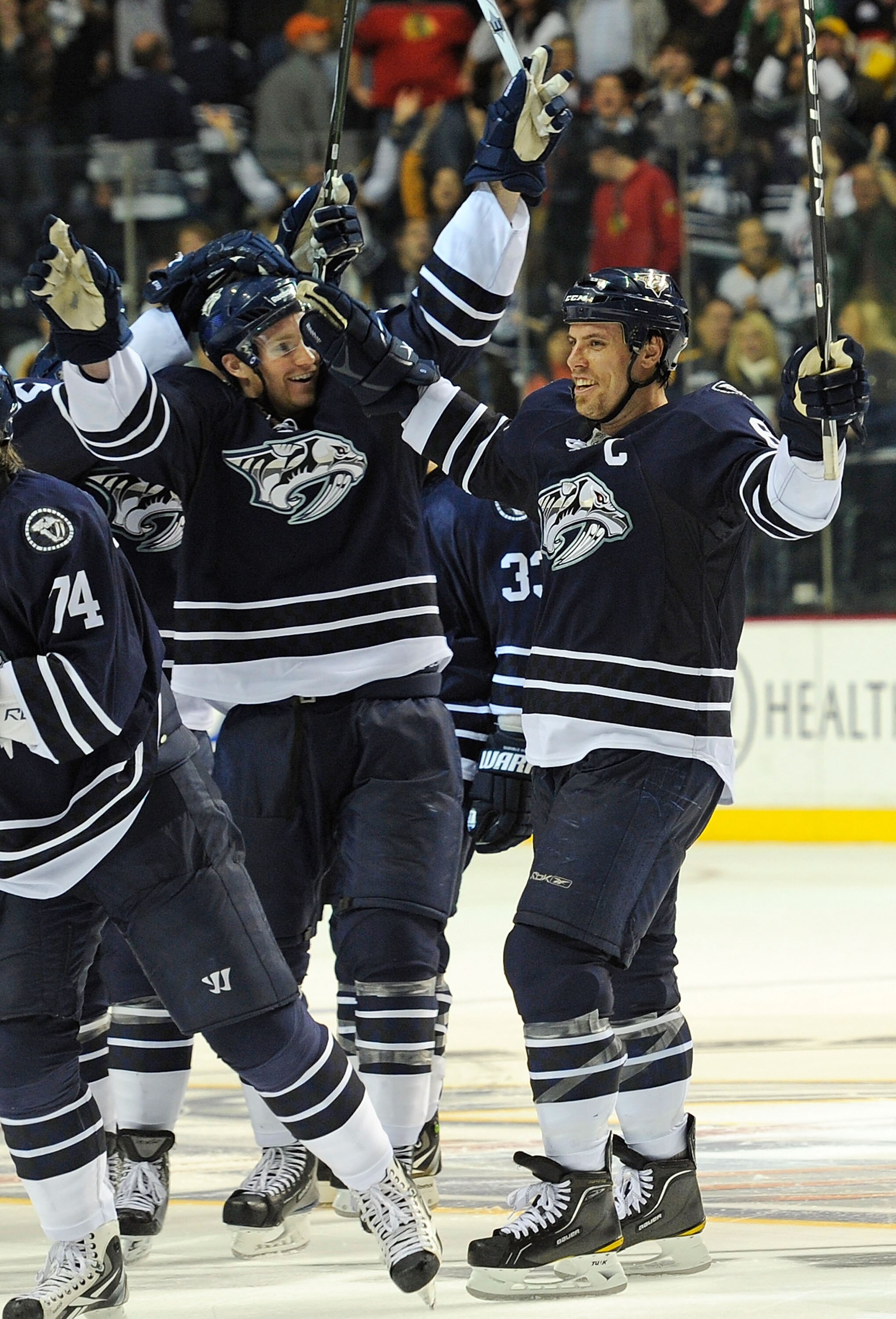 NASHVILLE, TN - NOVEMBER 13:  Cody Franson #4 and Shea Weber #6 of the Nashville Predators celebrate after a shootout win against the Chicago Blackhawks at the Bridgestone Arena on November 13, 2010 in Nashville, Tennessee.  (Photo by Frederick Breedon/Ge