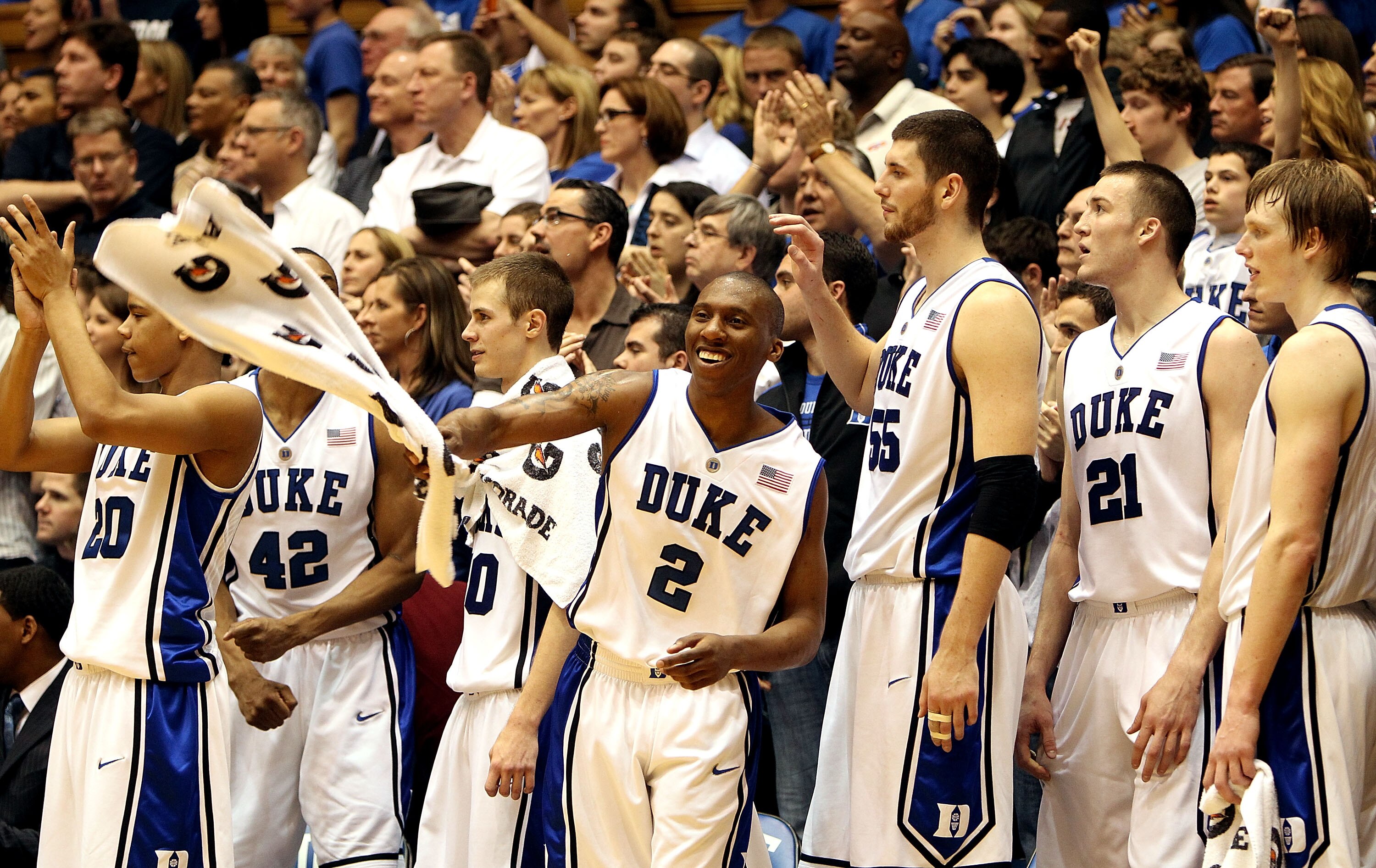 DURHAM, NC - MARCH 06:  Nolan Smith #2 of the Duke Blue Devils celebrates with teammates on the bench during their 82-50 victory over the North Carolina Tar Heels during their game at Cameron Indoor Stadium on March 6, 2010 in Durham, North Carolina.  (Ph