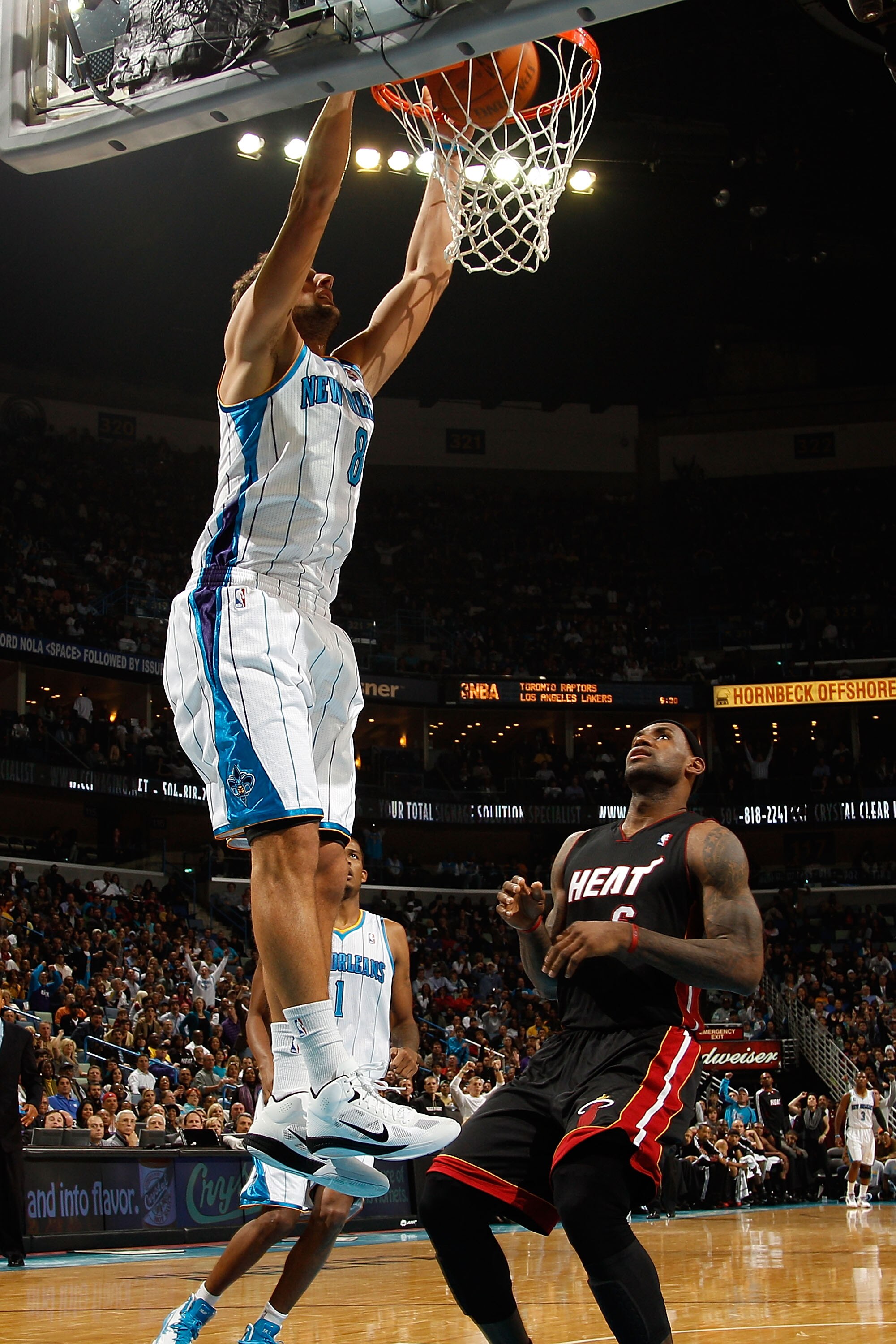 NEW ORLEANS - NOVEMBER 05:  Marco Belinelli #8 of the New Orleans Hornets dunks the ball during the game against the Miami Heat at the New Orleans Arena on November 5, 2010 in New Orleans, Louisiana.  NOTE TO USER: User expressly acknowledges and agrees t