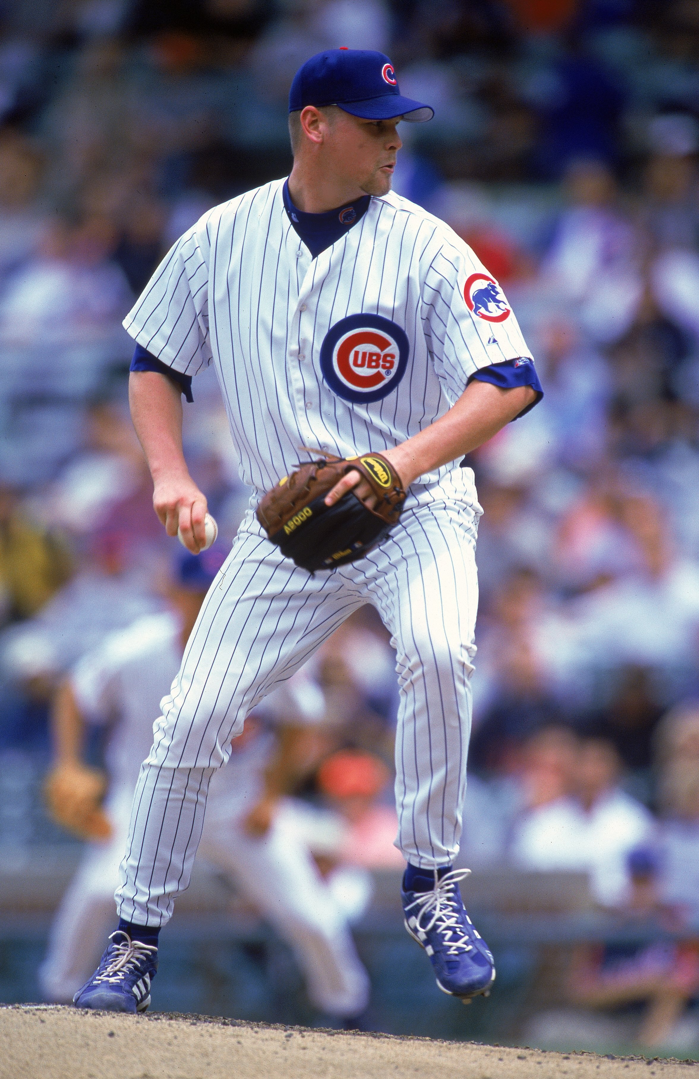 16 Jun 2000:  Pitcher Kerry Wood #34 of the Chicago Cubs winds up for the pitch during the game against the Montreal Expos at Wrigley Field in Chicago, Illinois.  The Cubs defeated the Expos 9-8.Mandatory Credit: Jonathan Daniel  /Allsport