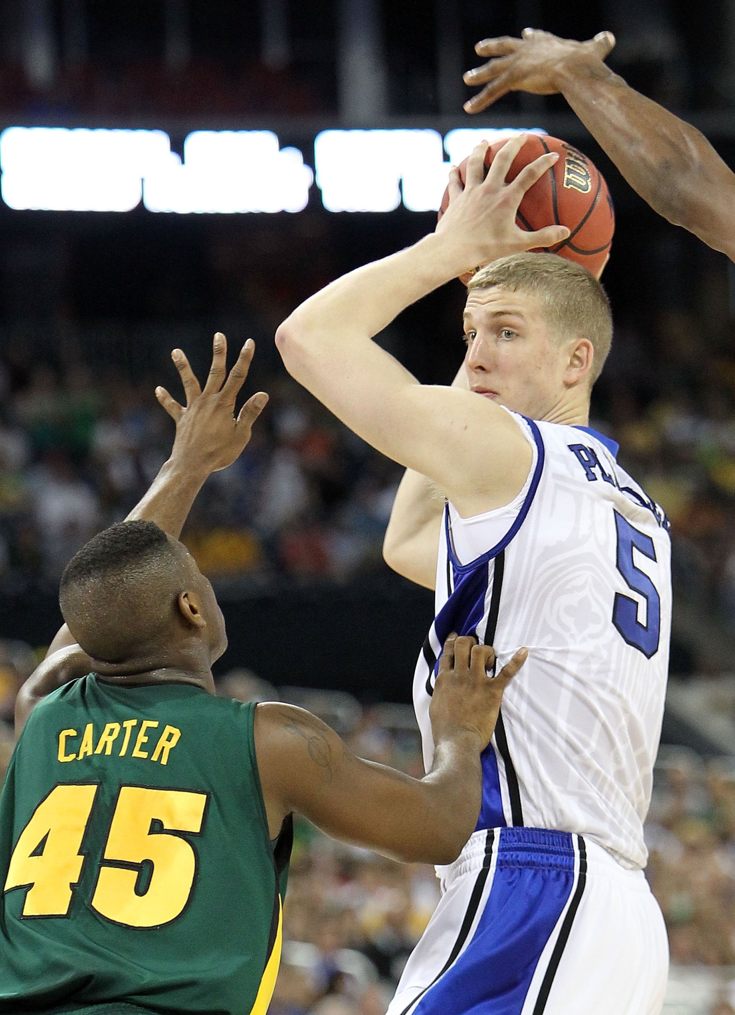 HOUSTON - MARCH 28: Mason Plumlee #5 of the Duke Blue Devils during the south regional final of the 2010 NCAA men's basketball tournament at Reliant Stadium on March 28, 2010 in Houston, Texas. (Photo by Ronald Martinez/Getty Images) HOUSTON - MARCH 28: Mason Plumlee #5 of the Duke Blue Devils during the south regional final of the 2010 NCAA men's basketball tournament at Reliant Stadium on March 28, 2010 in Houston, Texas. (Photo by Ronald Martinez/Getty Images)