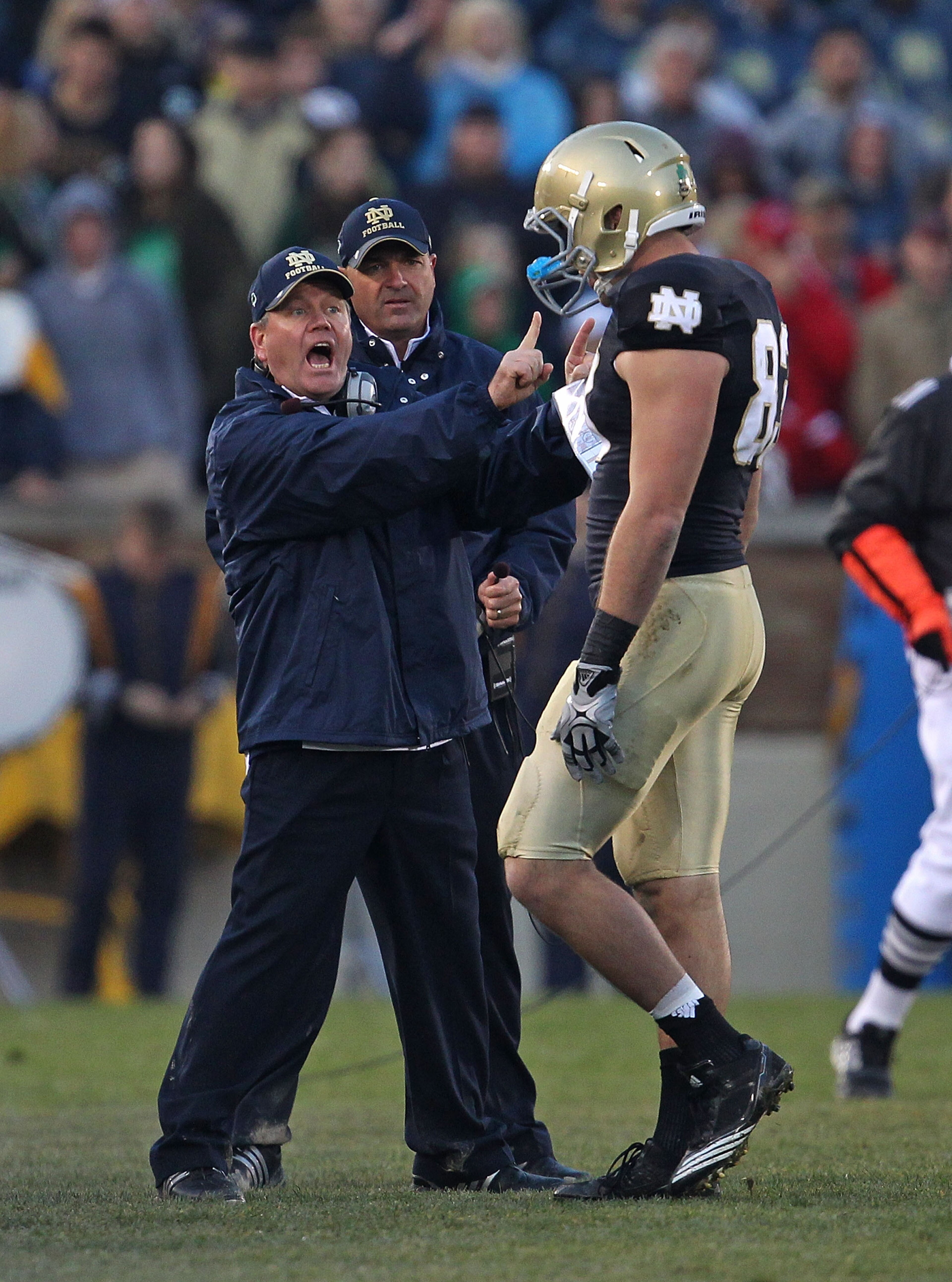 SOUTH BEND, IN - NOVEMBER 13: Head coach Brian Kelly of the Notre Dame Fighting Irish yells at Mike Ragone #83 during a game against the Utah Utes at Notre Dame Stadium on November 13, 2010 in South Bend, Indiana. Notre Dame defeated Utah 28-3. (Photo by SOUTH BEND, IN - NOVEMBER 13: Head coach Brian Kelly of the Notre Dame Fighting Irish yells at Mike Ragone #83 during a game against the Utah Utes at Notre Dame Stadium on November 13, 2010 in South Bend, Indiana. Notre Dame defeated Utah 28-3. (Photo by