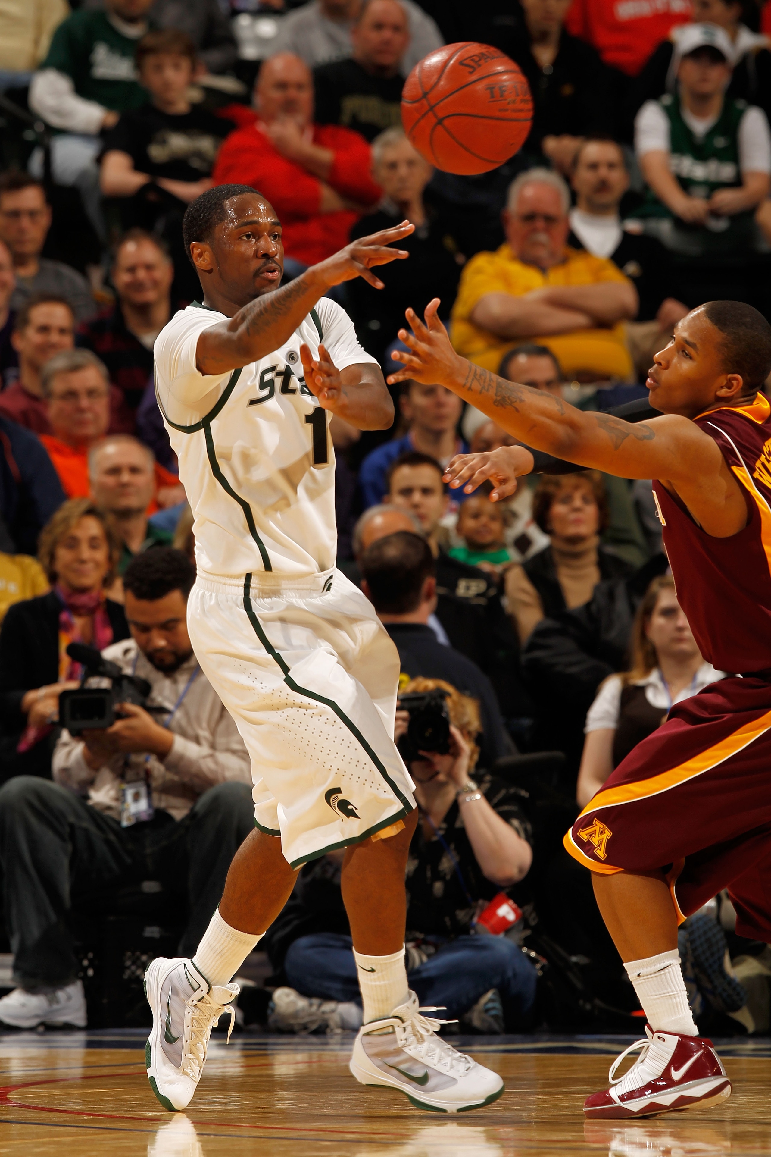 INDIANAPOLIS - MARCH 12:  Kalin Lucas #1 of the Michigan State Spartans moves the ball against the Minnesota Golden Gophers during the quarterfinals of the Big Ten Men's Basketball Tournament at Conseco Fieldhouse on March 12, 2010 in Indianapolis, Indian