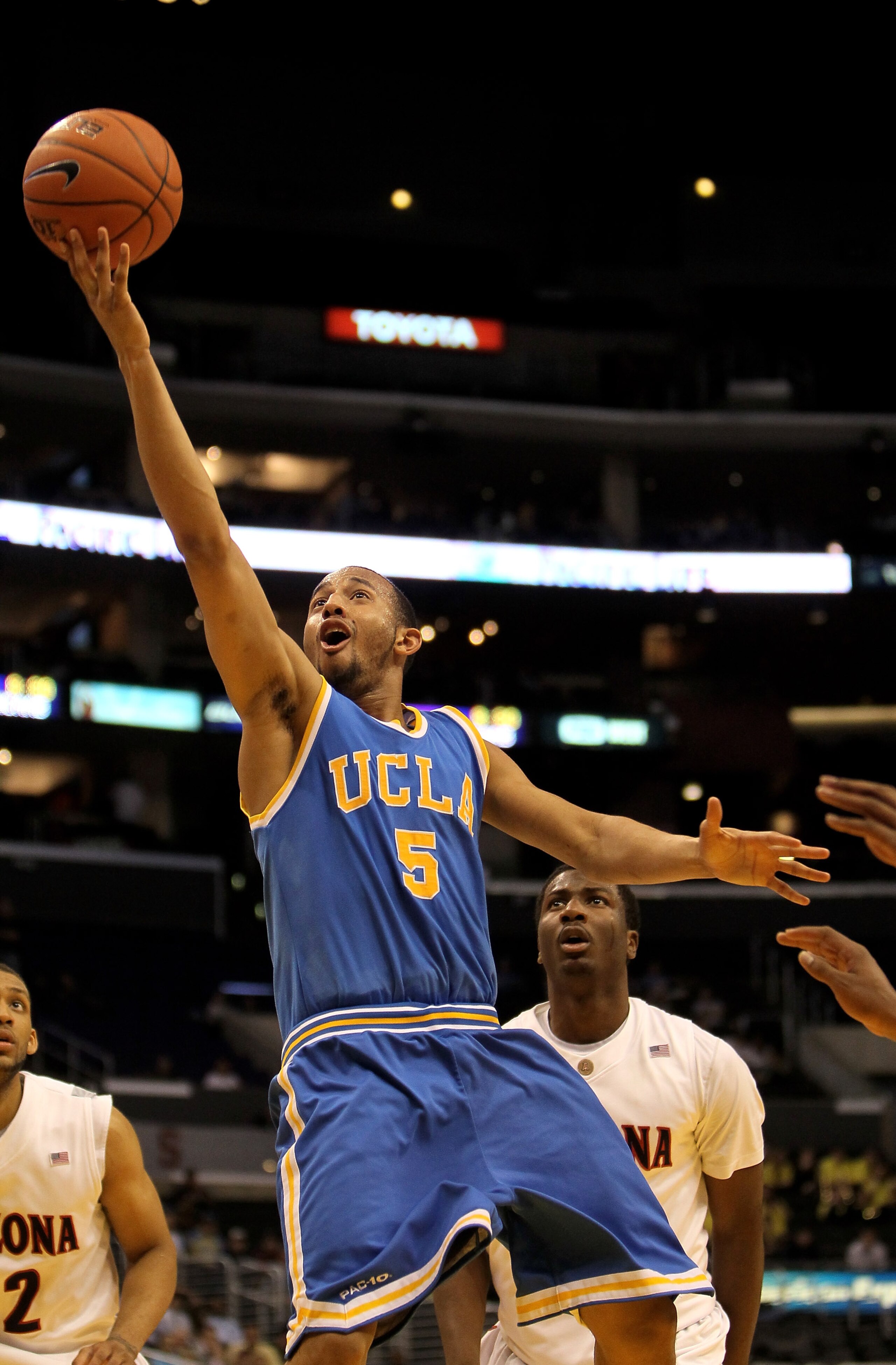 LOS ANGELES, CA - MARCH 11:  Jerime Anderson #5 of the UCLA Bruins shoots against the Arizona Wildcats during the quarterfinals of the Pac-10 Basketball Tournament at Staples Center on March 11, 2010 in Los Angeles, California. UCLA won 75-69.  (Photo by