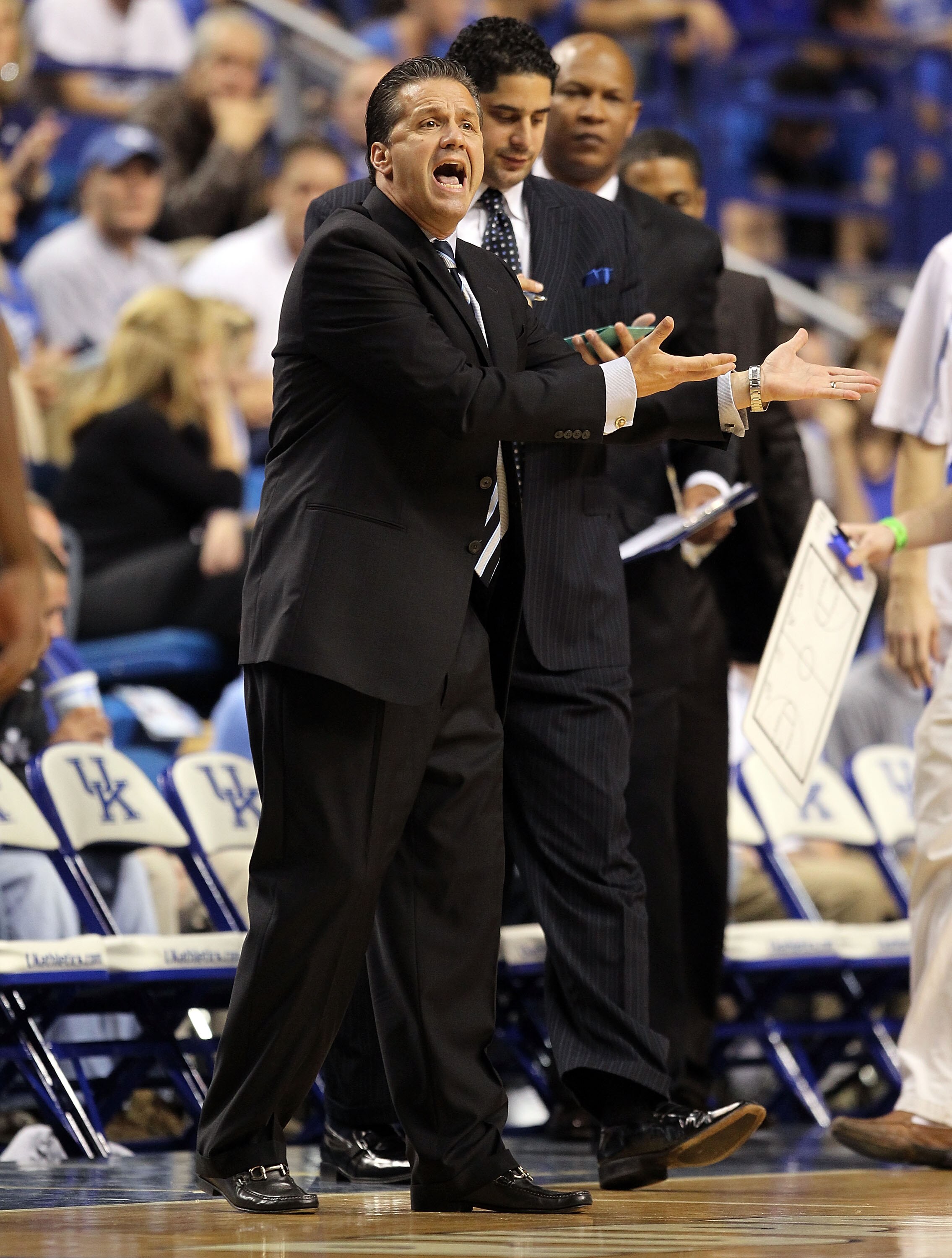LEXINGTON, KY - NOVEMBER 12:  John Calipari the Head Coach of the Kentucky Wildcats gives   instructions to his team during the game against East Tennessee State Buccaneers at Rupp Arena on November 12, 2010 in Lexington, Kentucky.  (Photo by Andy Lyons/G
