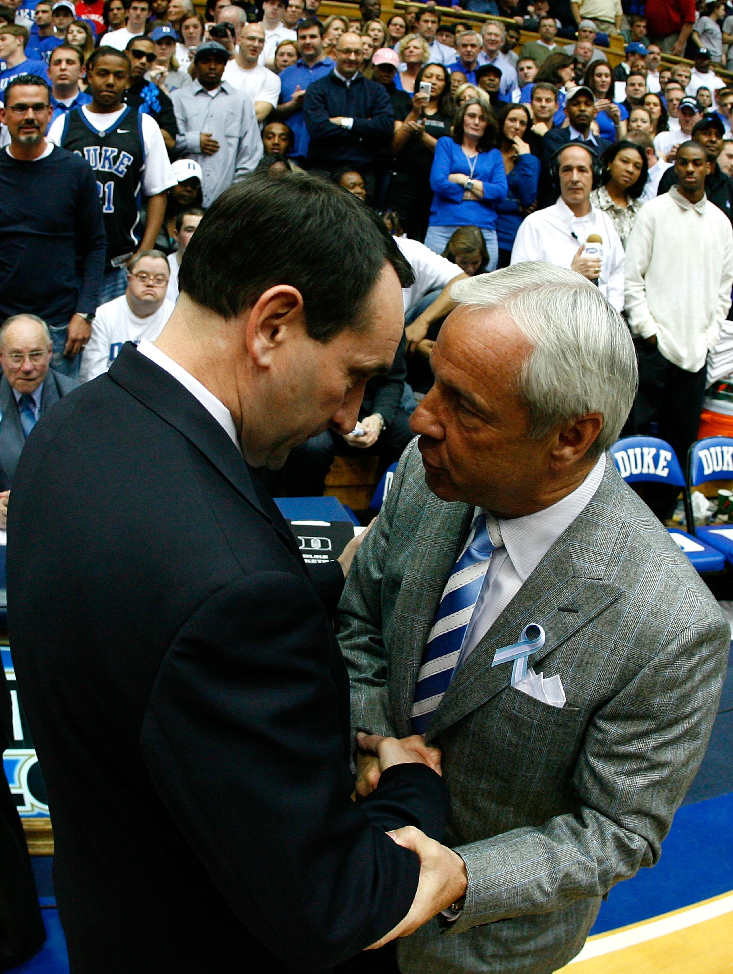DURHAM, NC - MARCH 8:  Head coach Mike Krzyzewski (L) of the Duke Blue Devils shakes hands with head coach Roy Williams of the North Carolina Tar Heels before their game at Cameron Indoor Stadium March 8, 2008 in Durham, North Carolina.  (Photo by Kevin C